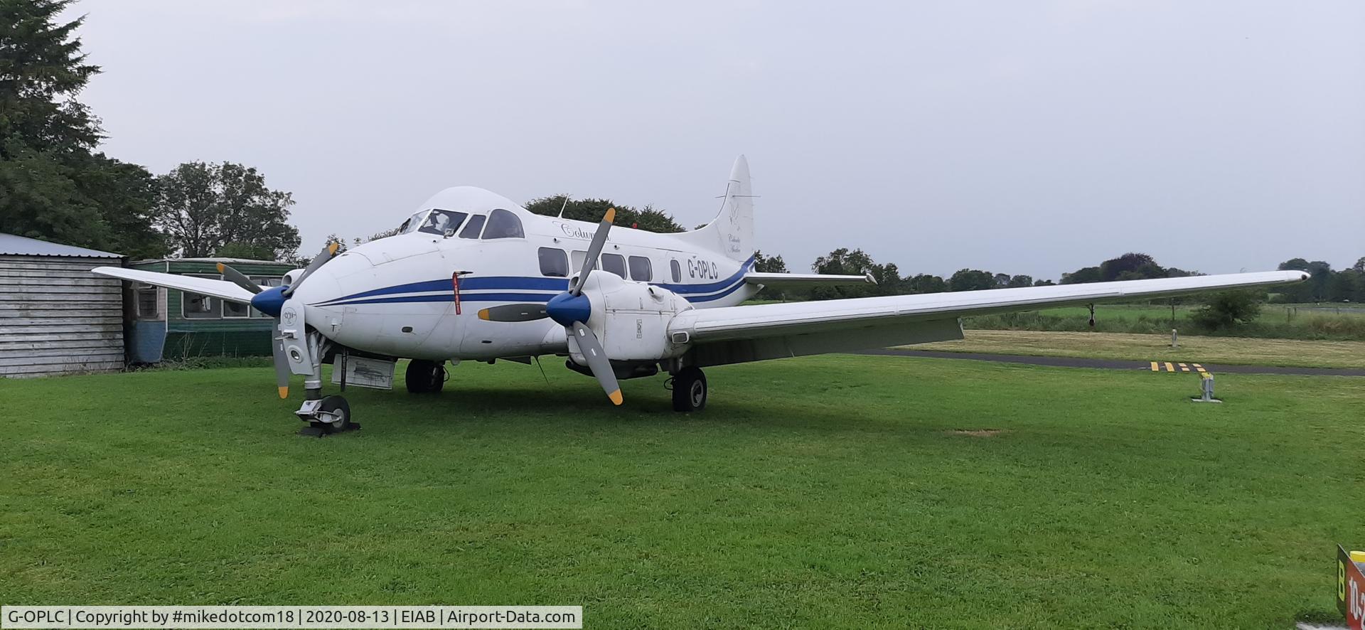 G-OPLC, 1948 De Havilland DH-104 Dove 8 C/N 04212, Beautiful Dove parked on the grass at Abbeyshrule.