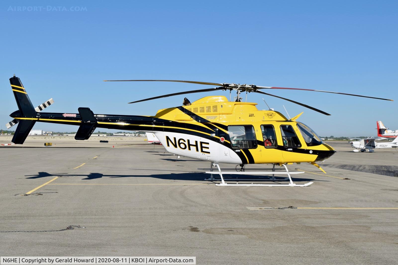 N6HE, 1997 Bell 407 C/N 53235, Parked on the north GA ramp.