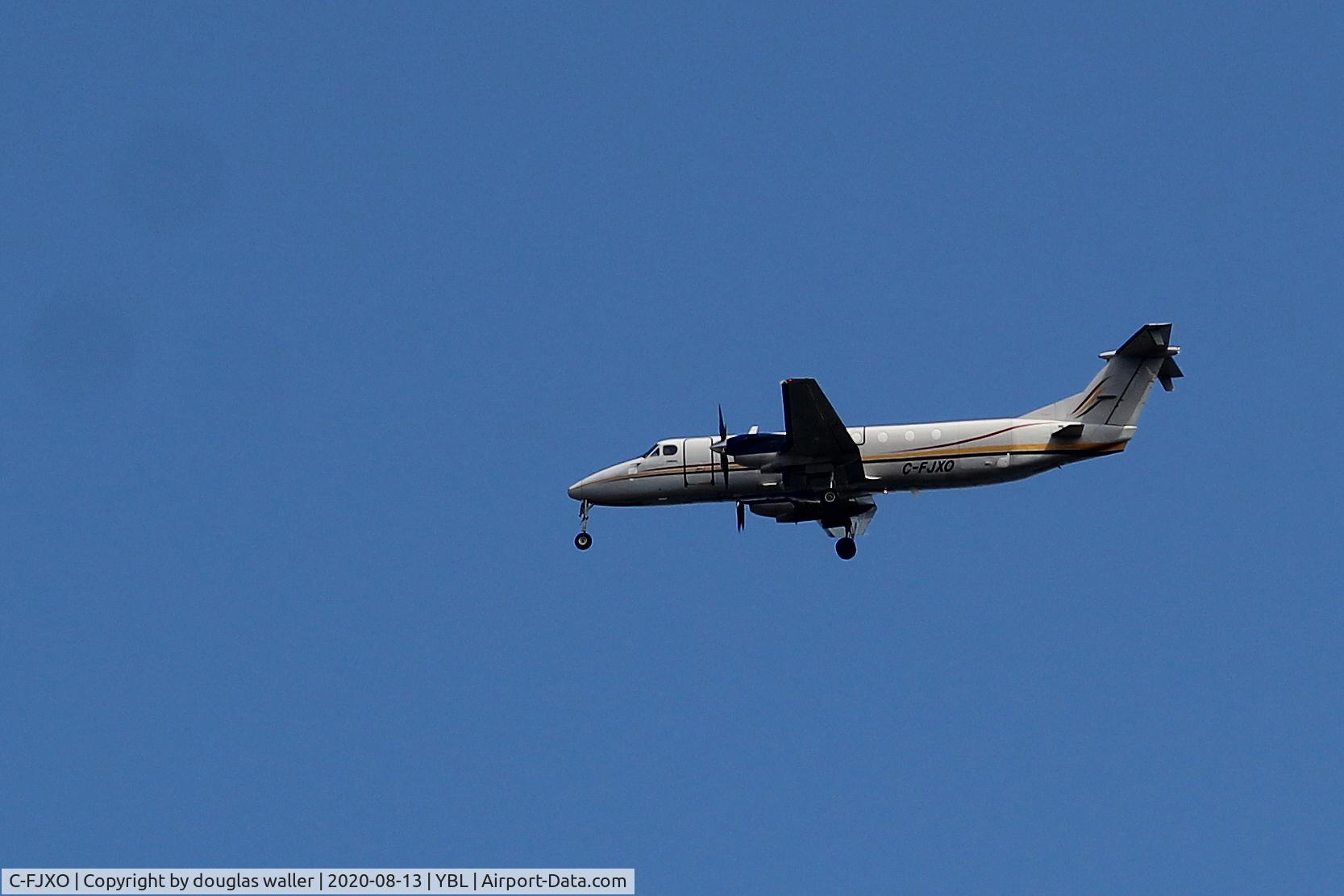 C-FJXO, 1956 De Havilland Canada DHC-2 Beaver Mk.1 C/N 1036, photographed a Beech 1900C  C-FJXO  over Campbell River headed for YBL  mid-afternoon on Aug 13, 2020... it is not a Beaver as stated above by the website