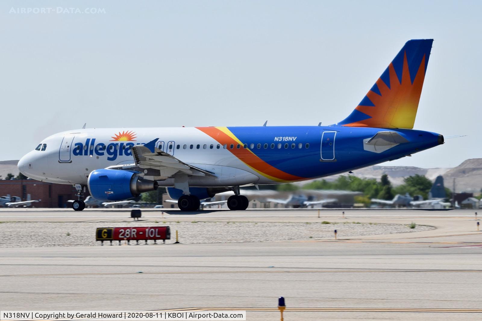N318NV, 2005 Airbus A319-111 C/N 2492, Landing run out on 10L.