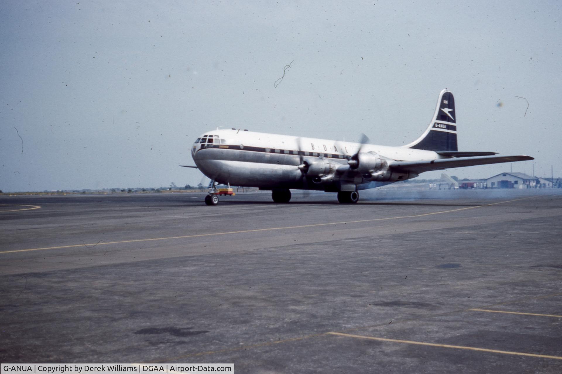 G-ANUA, 1949 Boeing 377-10-34 Stratocruiser C/N 15968, Taken at Accra (Kotoka) airport in Ghana in 1957 or '58 by my father. We lived there and would go to the airport to watch the planes. This is a family slide.