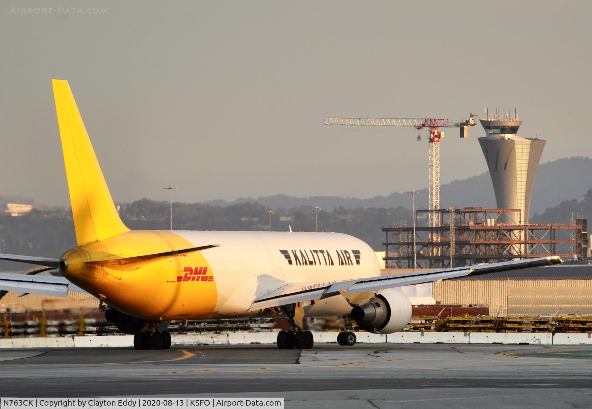 N763CK, 1993 Boeing 767-3P6/ERF C/N 26233, Not sure what they are building by the tower. SFO 2020.