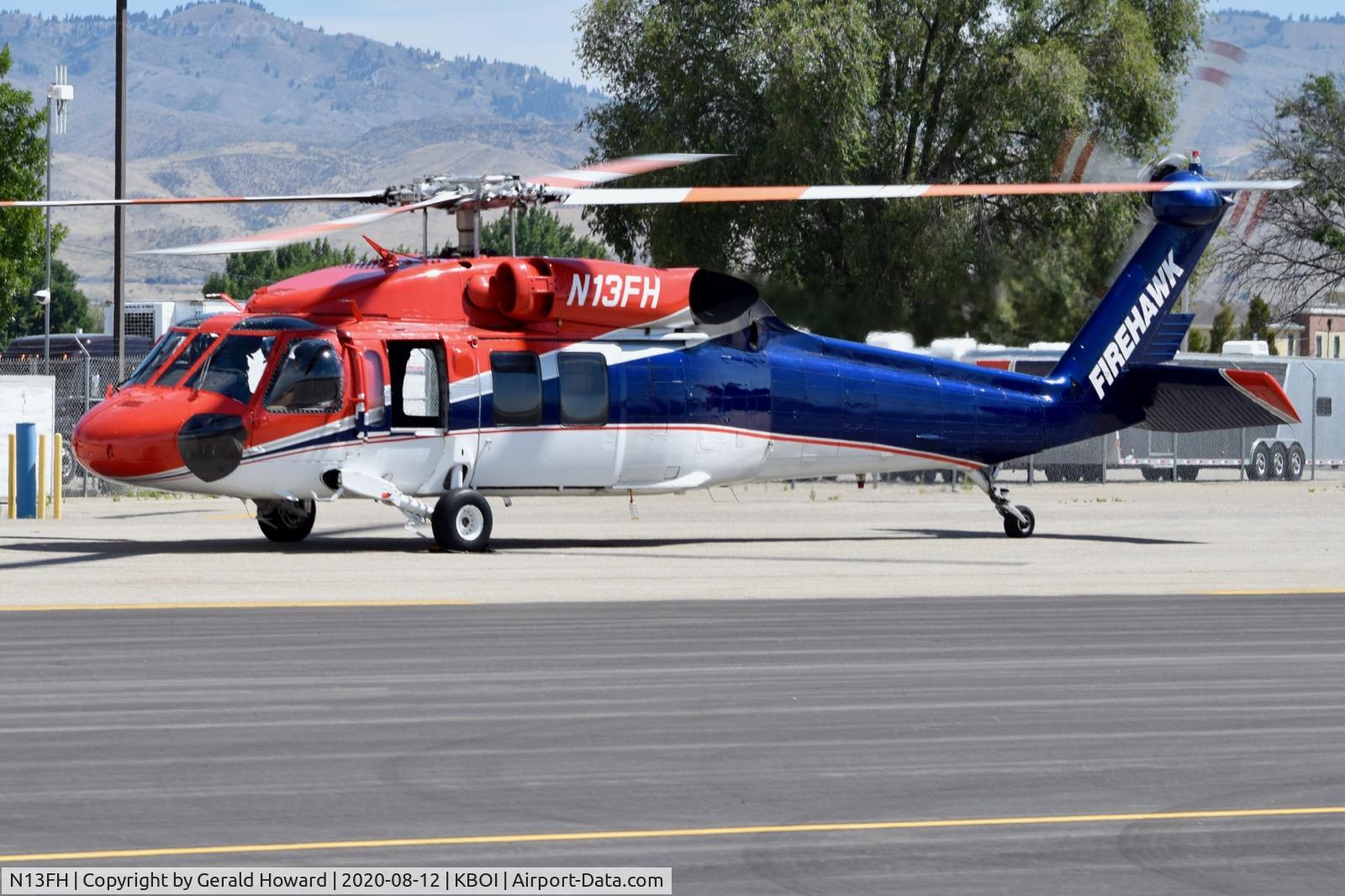 N13FH, 1997 Cessna 525 CitationJet C/N 525-0185, Parked on Firehawk ramp. New paint job since last year.