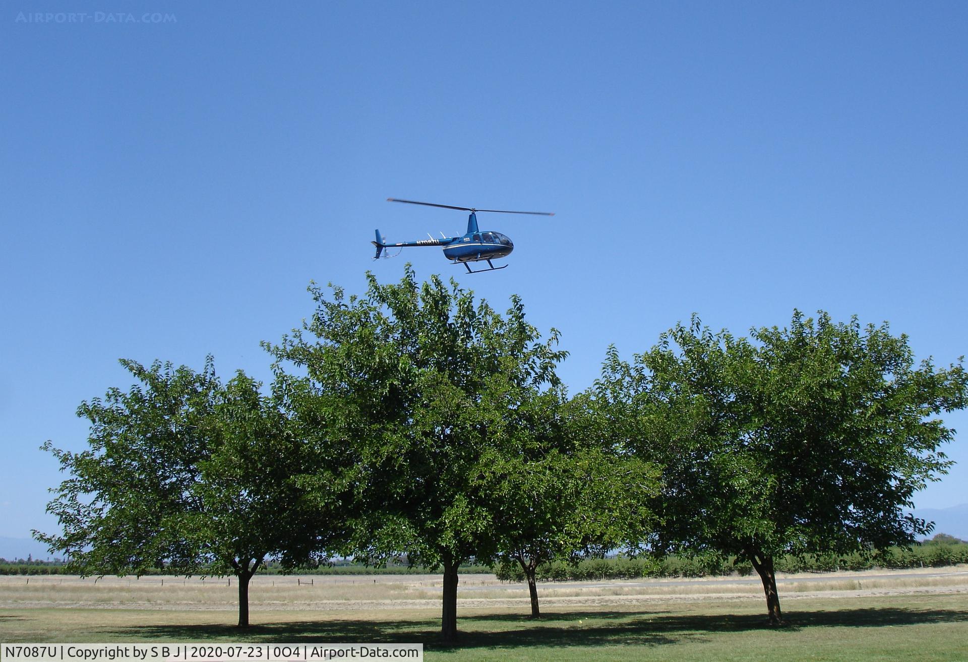 N7087U, 2014 Robinson R66 C/N 0293, 7087U is now a Robinson R66. 87U was on short final at the Corning airport.