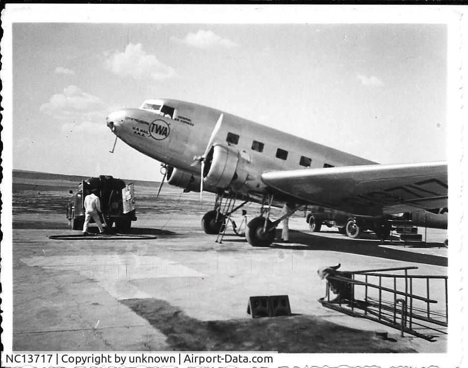 NC13717, 1934 Douglas DC-2-112 (C-32A) C/N 1243, Found four photos in a family album. My grandfather was a business man and traveled a lot. So this may have been taken on one of his trips. He lived in St. Louis so I'm also assuming this is Lambert. Let me know if you'd like the other three photos.
