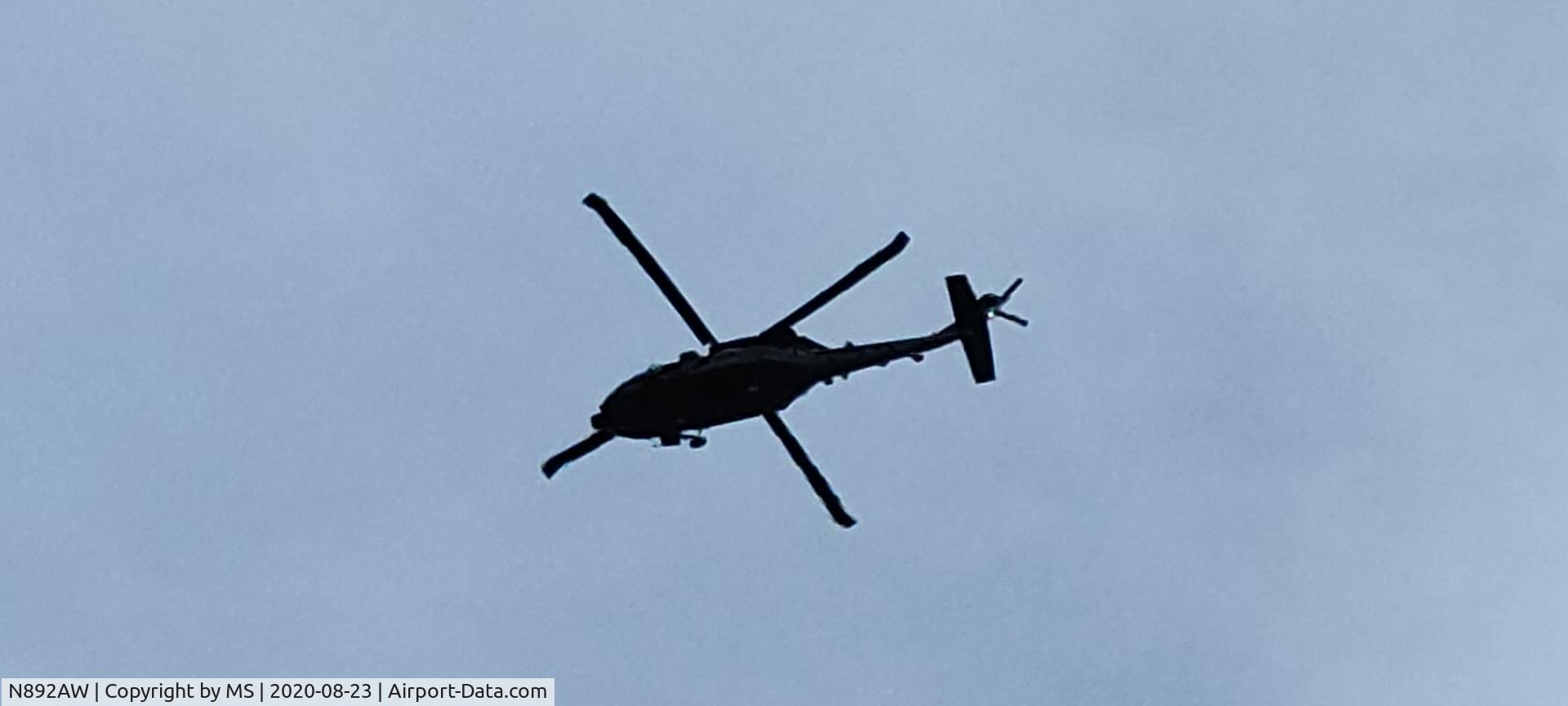 N892AW, Sikorsky HH-60L Black Hawk C/N 70-717, In flight over east Orlando, Florida.
