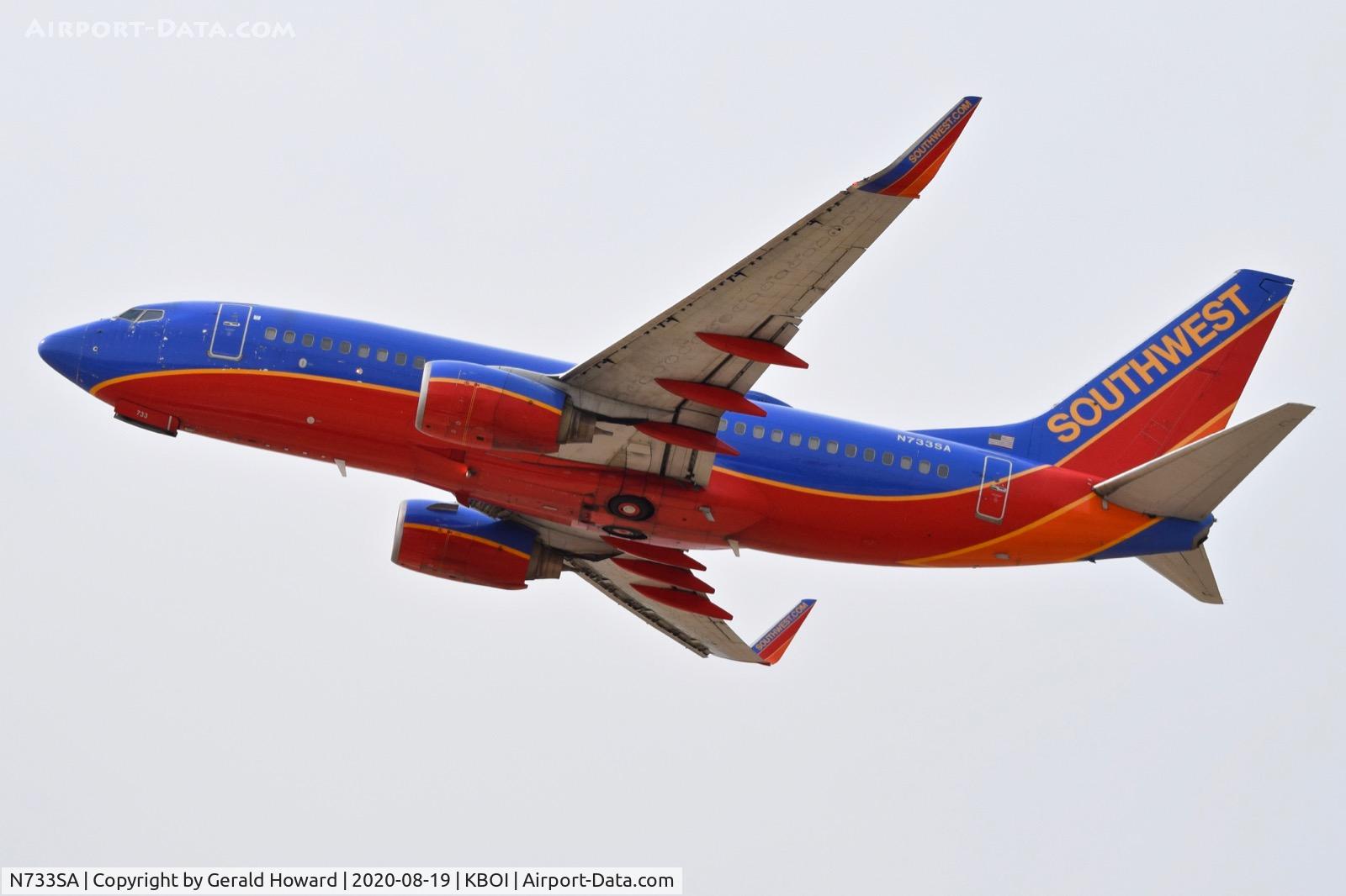 N733SA, 1999 Boeing 737-7H4 C/N 27865, Climb out from 10L.