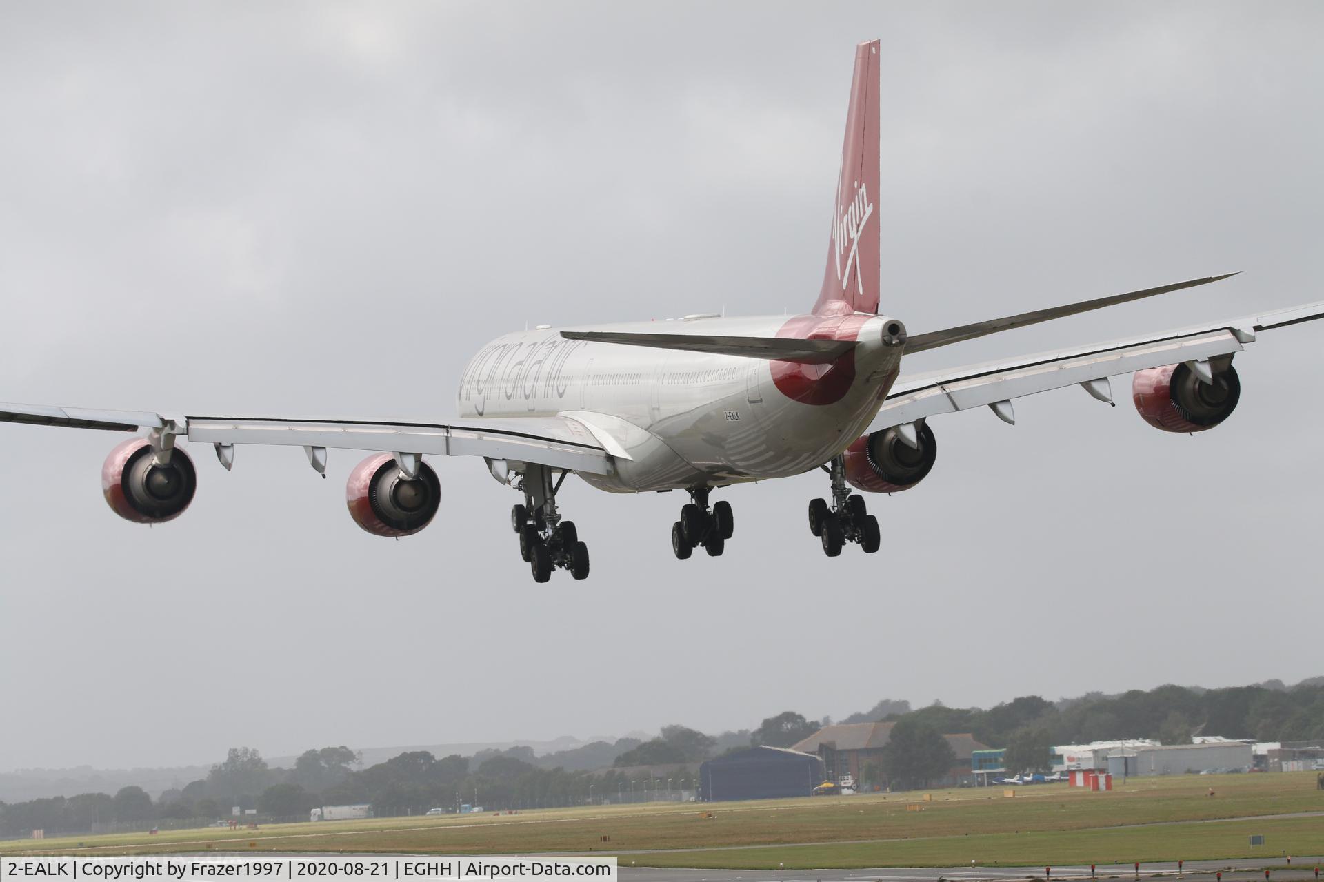 2-EALK, 2006 Airbus A340-642 C/N 768, Arriving at Bournemouth.