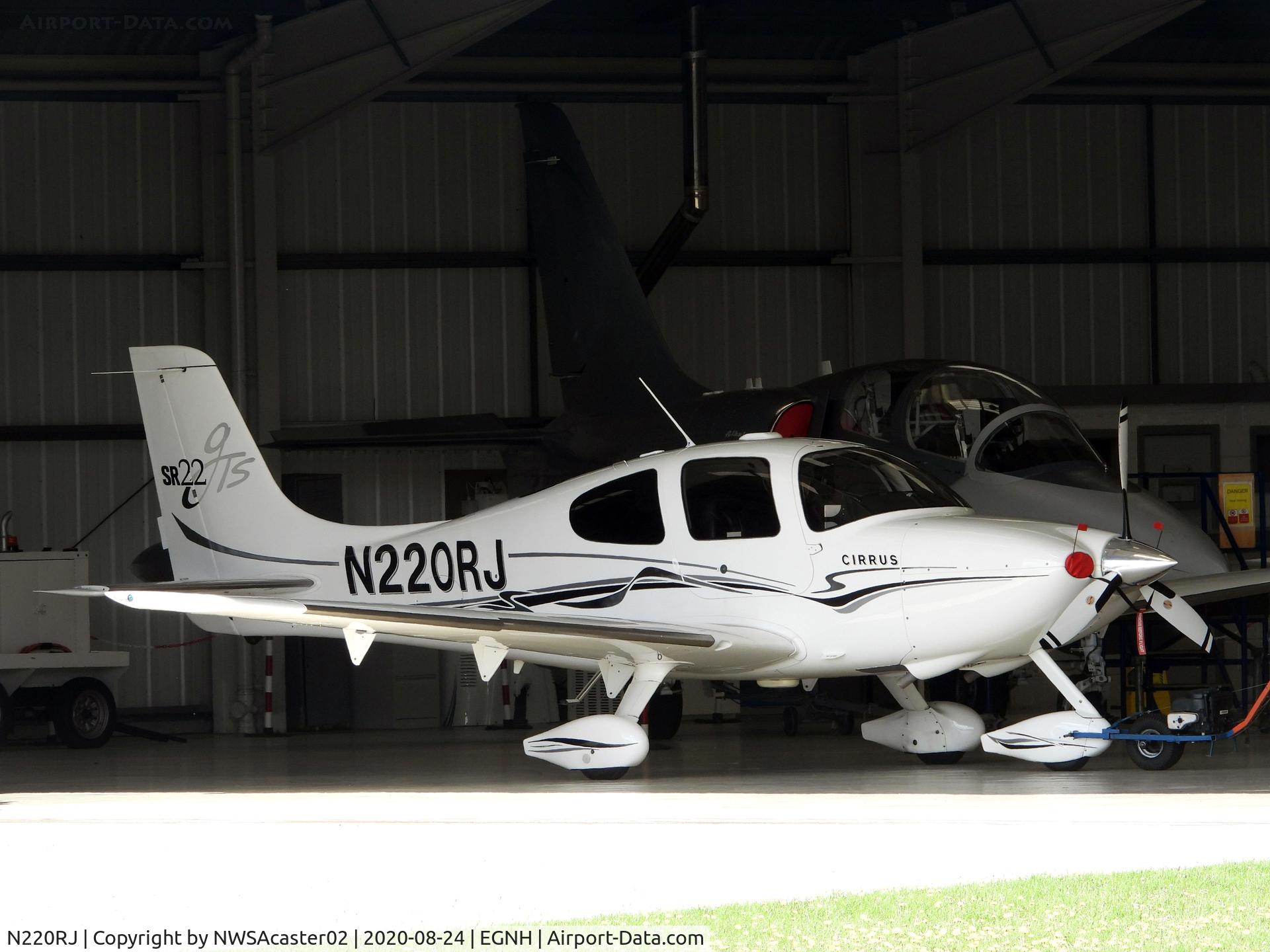 N220RJ, 2006 Cirrus SR22 C/N 1775, In Hangar 3 with G-SHMB behind