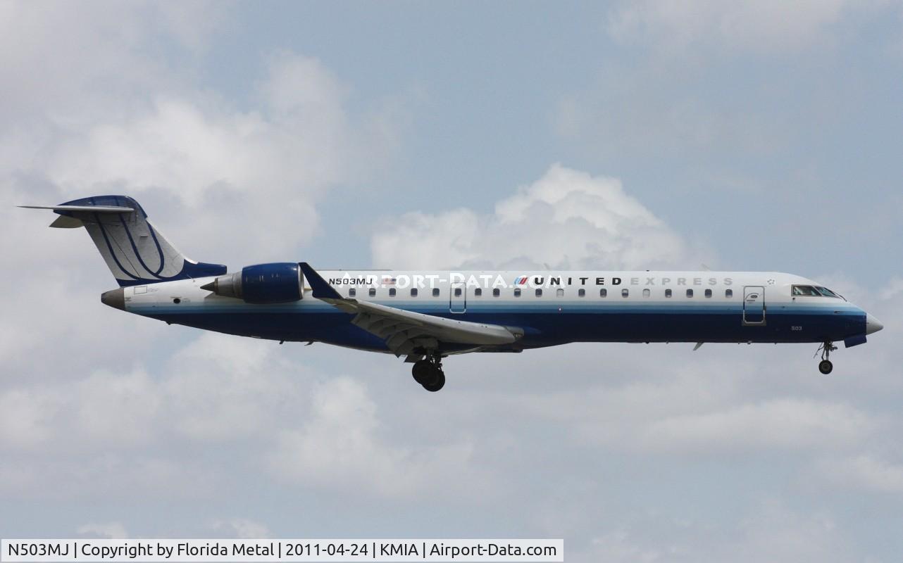 N503MJ, 2002 Bombardier CRJ-700 (CL-600-2C10) Regional Jet C/N 10058, MIA 2011