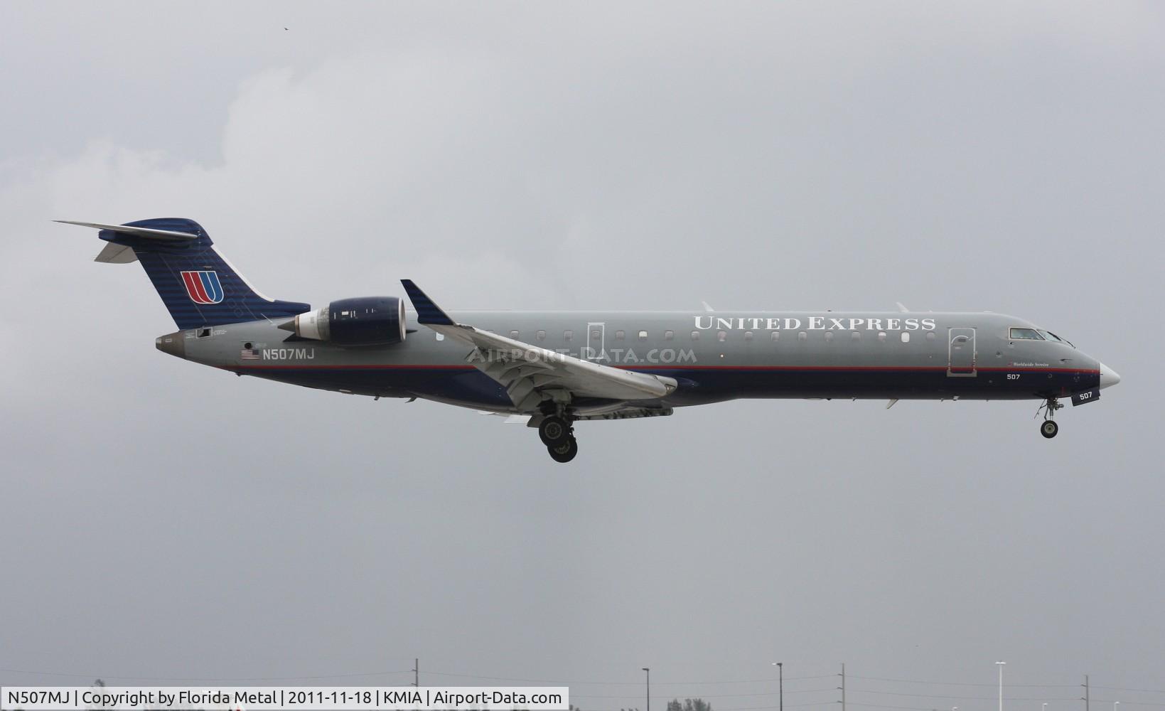 N507MJ, 2003 Bombardier CRJ-701 (CL-600-2C10) Regional Jet C/N 10017, MIA 2011