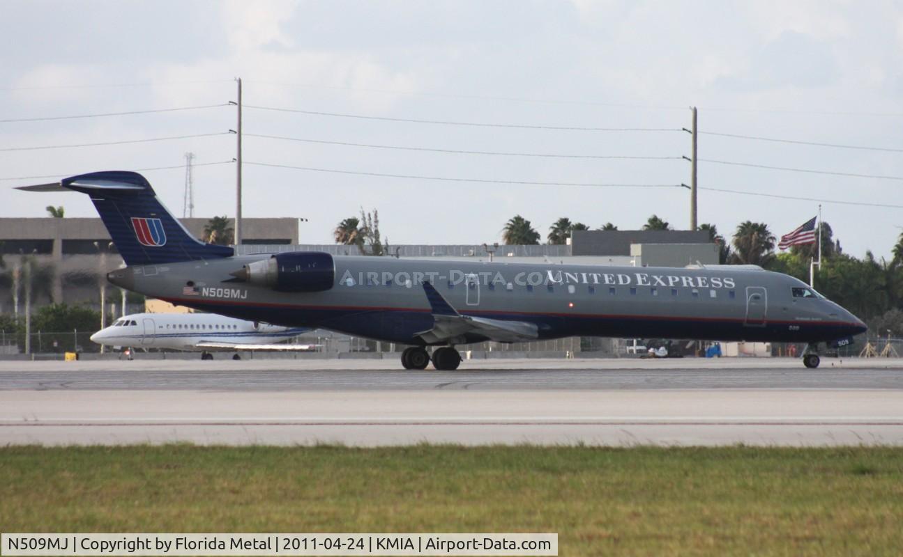 N509MJ, 2003 Bombardier CRJ-700 (CL-600-2C10) Regional Jet C/N 10094, MIA 2011