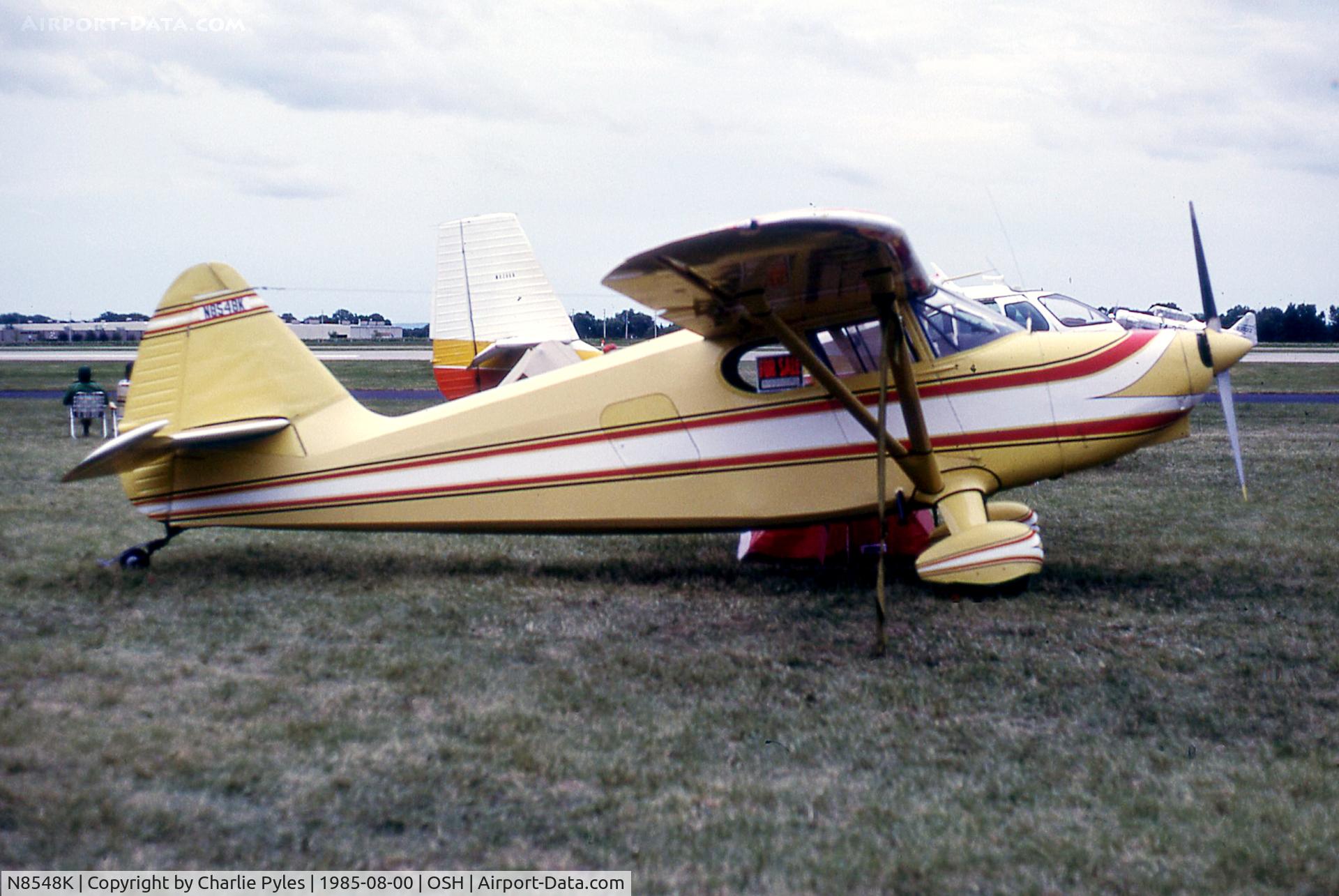 N8548K, Stinson 108-1 Voyager C/N 108-1548, Beside a Republic Seabee