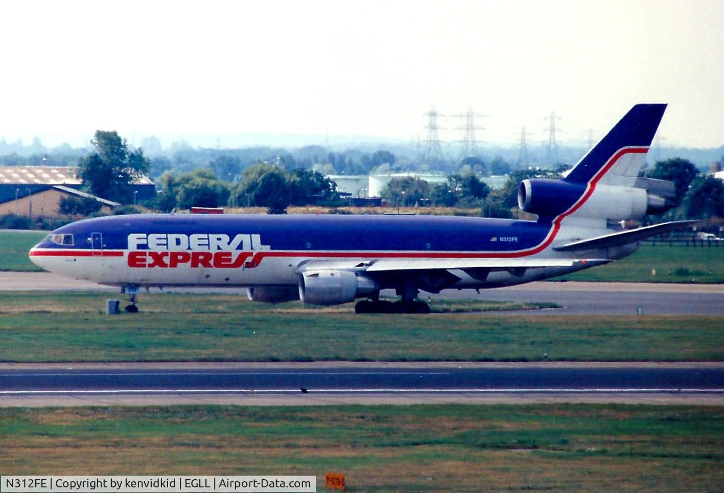N312FE, 1987 McDonnell Douglas MD-10-30F C/N 48300, At London Heathrow, early 1990's.