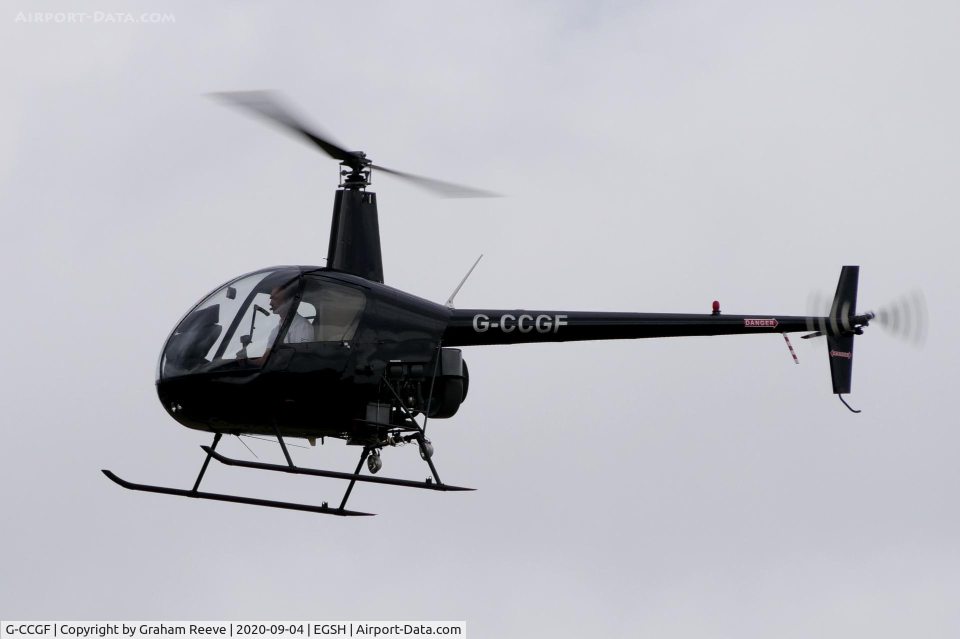 G-CCGF, 2003 Robinson R22 Beta C/N 3454, Landing at Norwich.