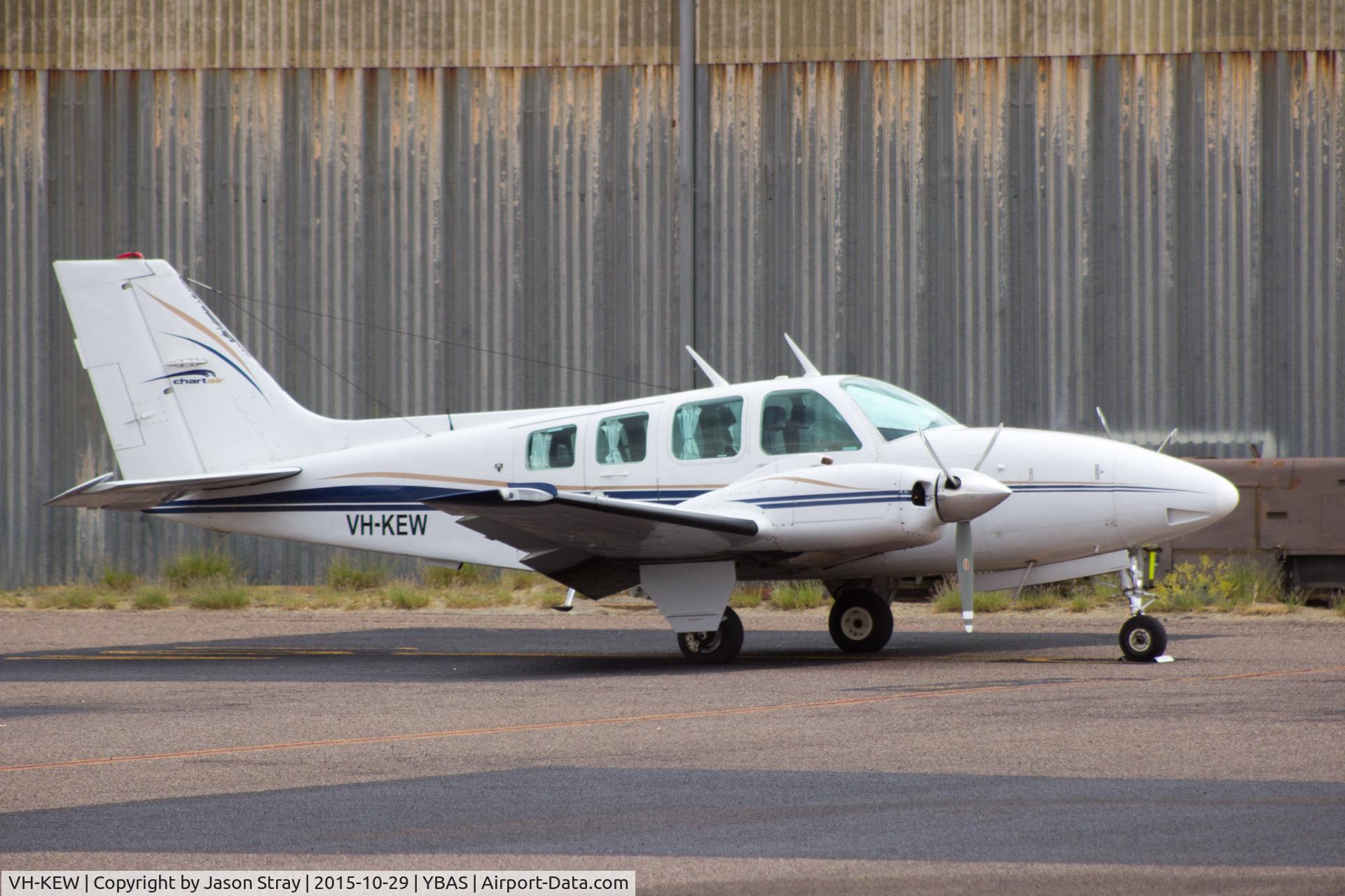 VH-KEW, 1977 Beech 58 Baron C/N TH-803, Parked at YBAS Alice Springs NT operated by Chartair Pty LTD