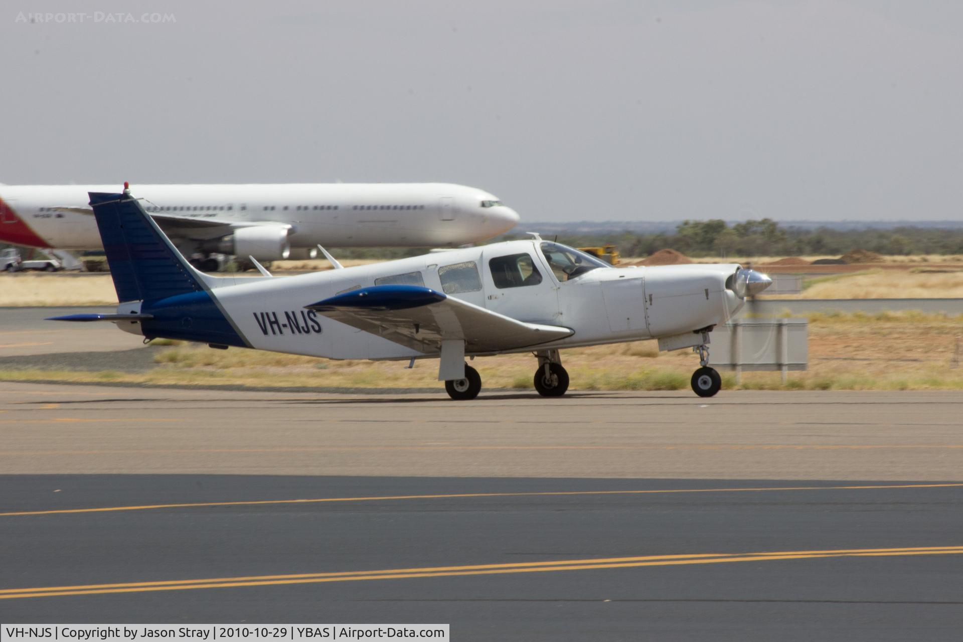 VH-NJS, 1976 Piper PA-32R-300 Cherokee Lance C/N 32R-7680193, Taxiing to RWY12 YBAS Alice Springs for VFR Flight