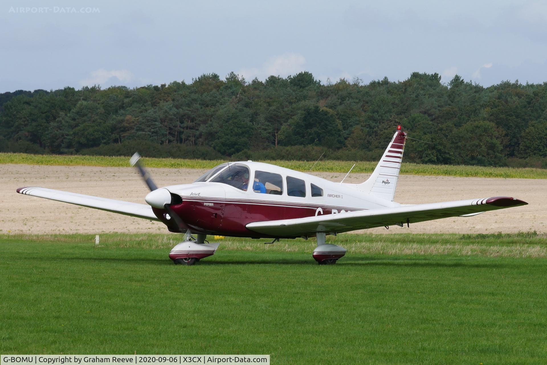 G-BOMU, 1977 Piper PA-28-181 Cherokee Archer II C/N 28-7790318, Just landed at Northrepps.