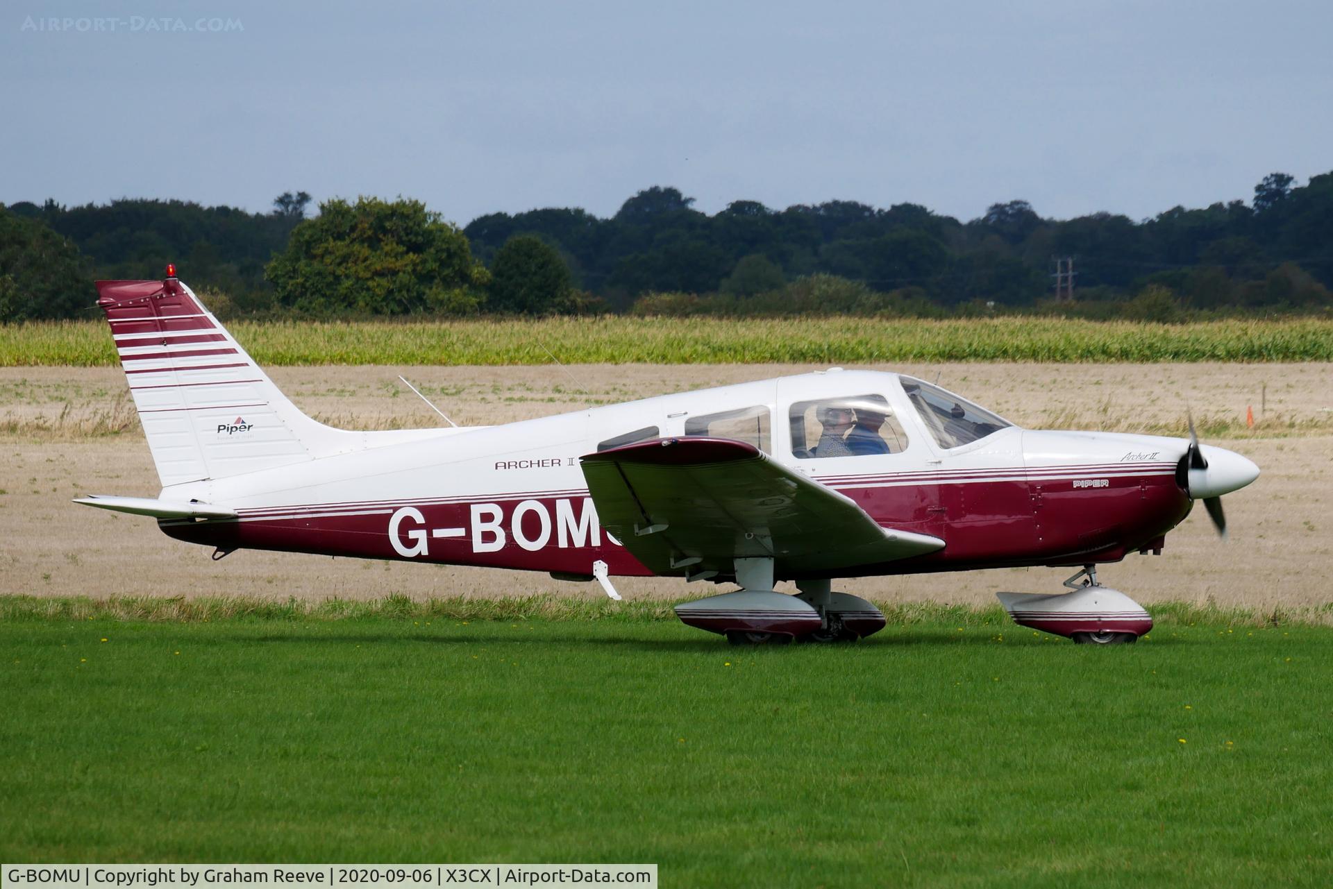 G-BOMU, 1977 Piper PA-28-181 Cherokee Archer II C/N 28-7790318, Just landed at Northrepps.