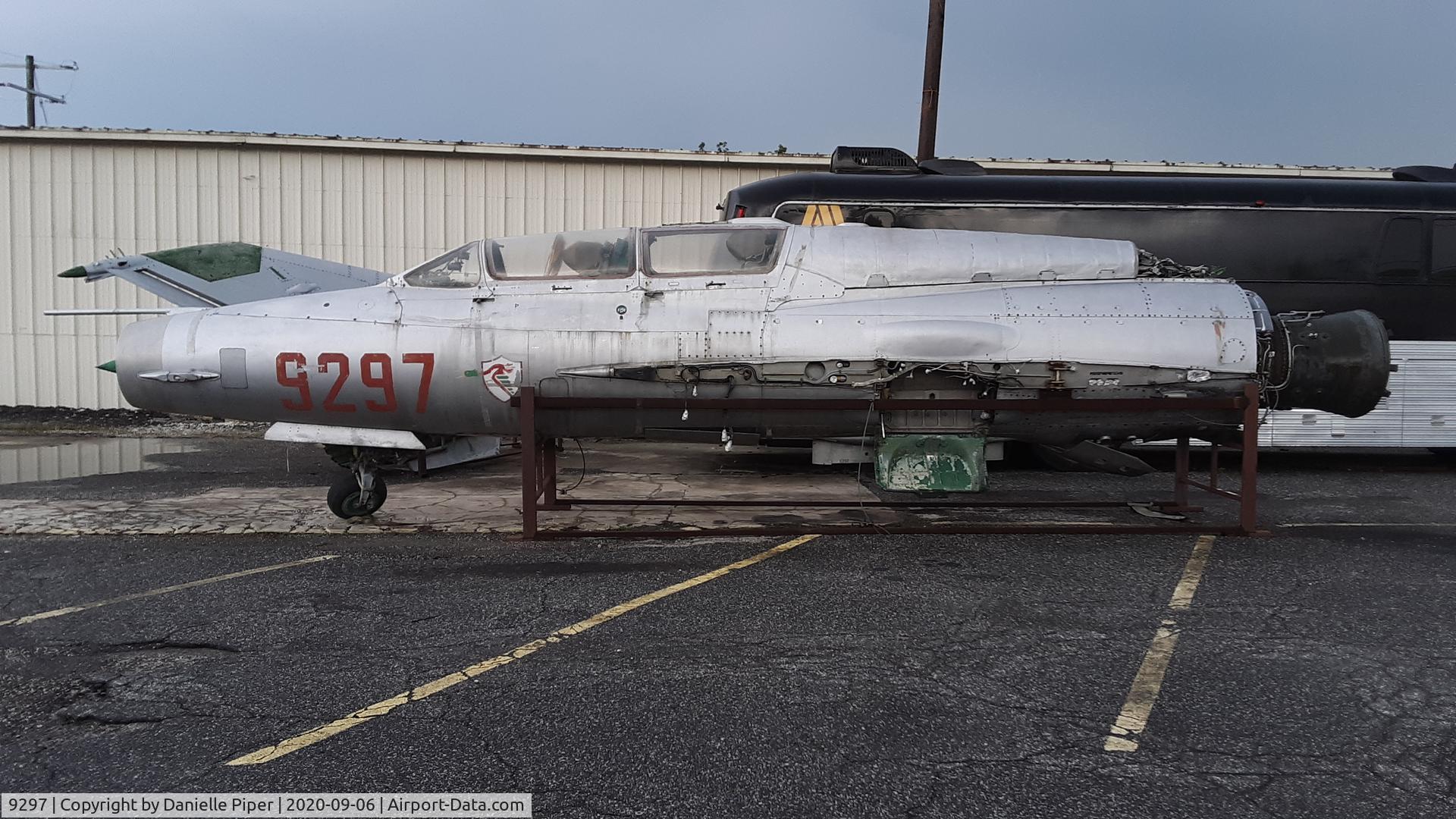 9297, Mikoyan-Gurevich MiG-21UM C/N 516999297, Disassembled for transport.