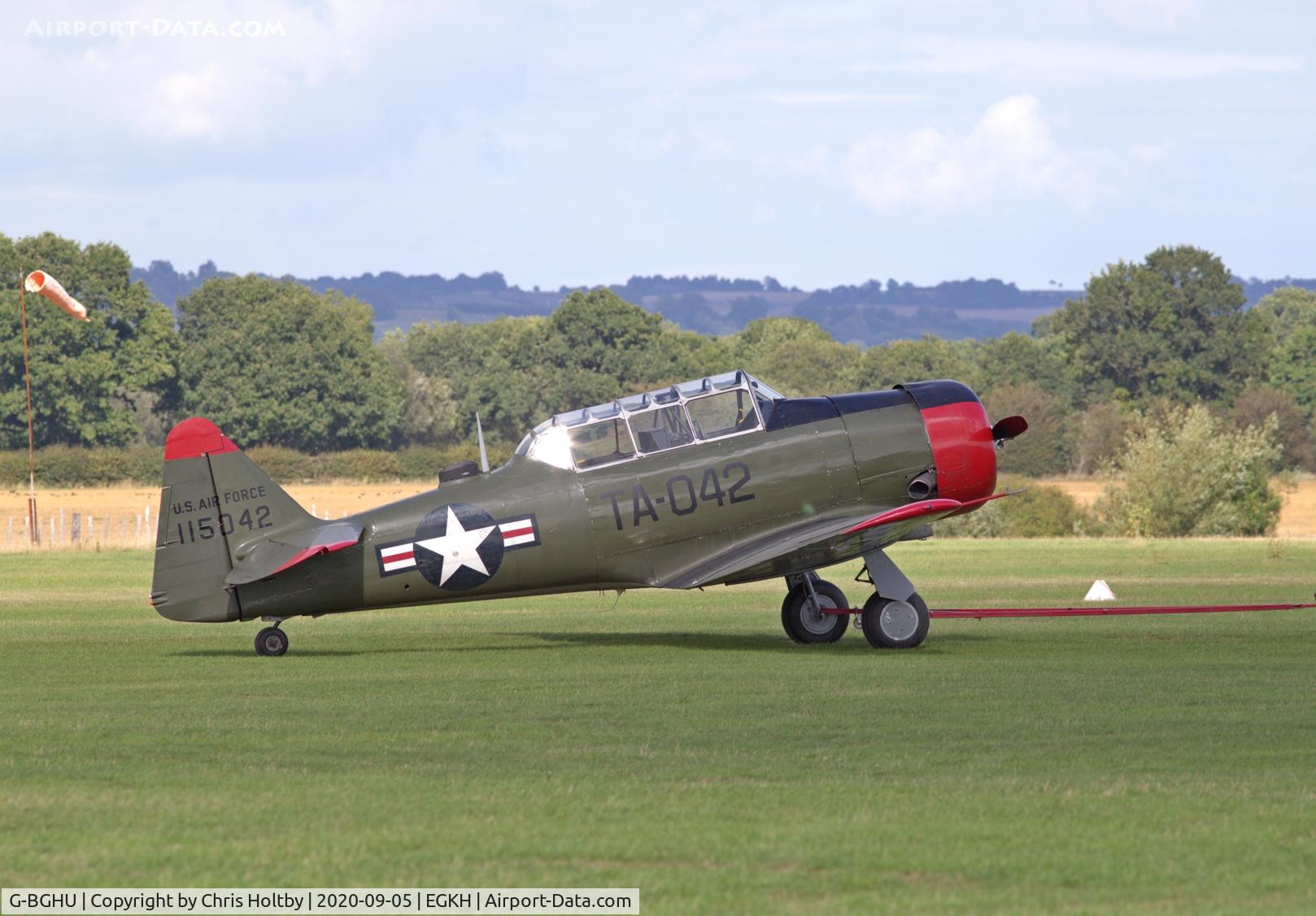 G-BGHU, 1944 North American T-6G Texan C/N 182-729, Being towed back to hangar at Headcorn, Kent