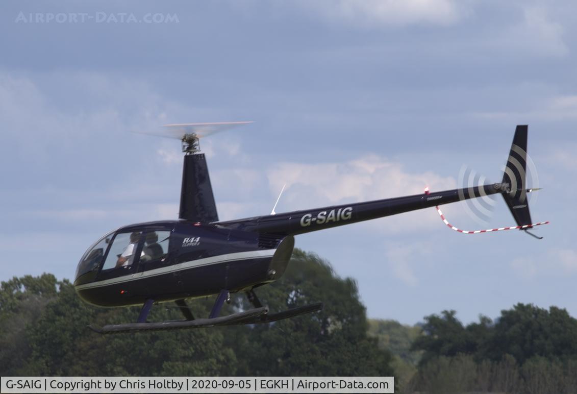 G-SAIG, 2006 Robinson R44 II C/N 11364, Lifting off from Headcorn for another pleasure flight