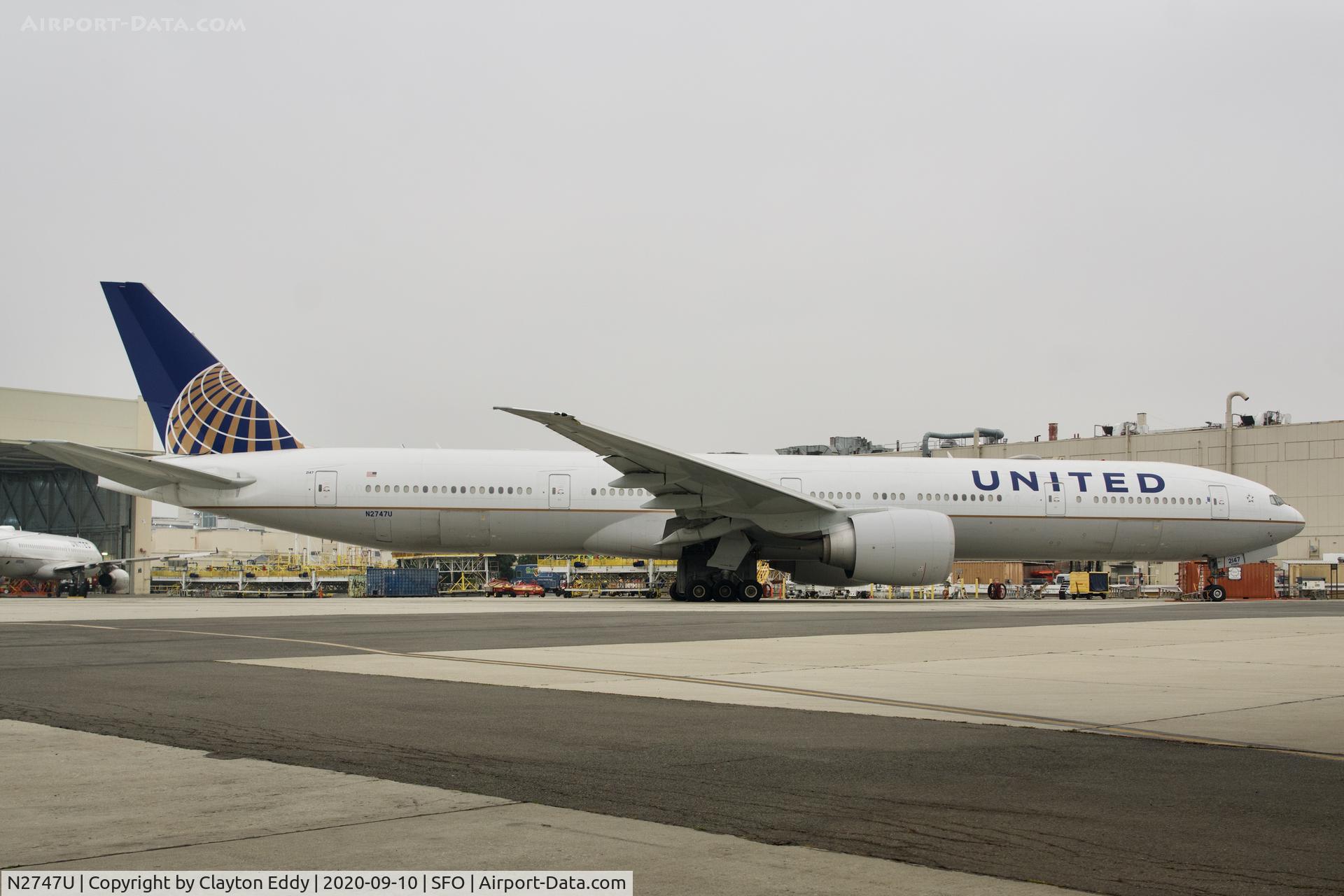 N2747U, 2018 Boeing 777-322/ER C/N 64991, Smokey day. SFO 2020.
