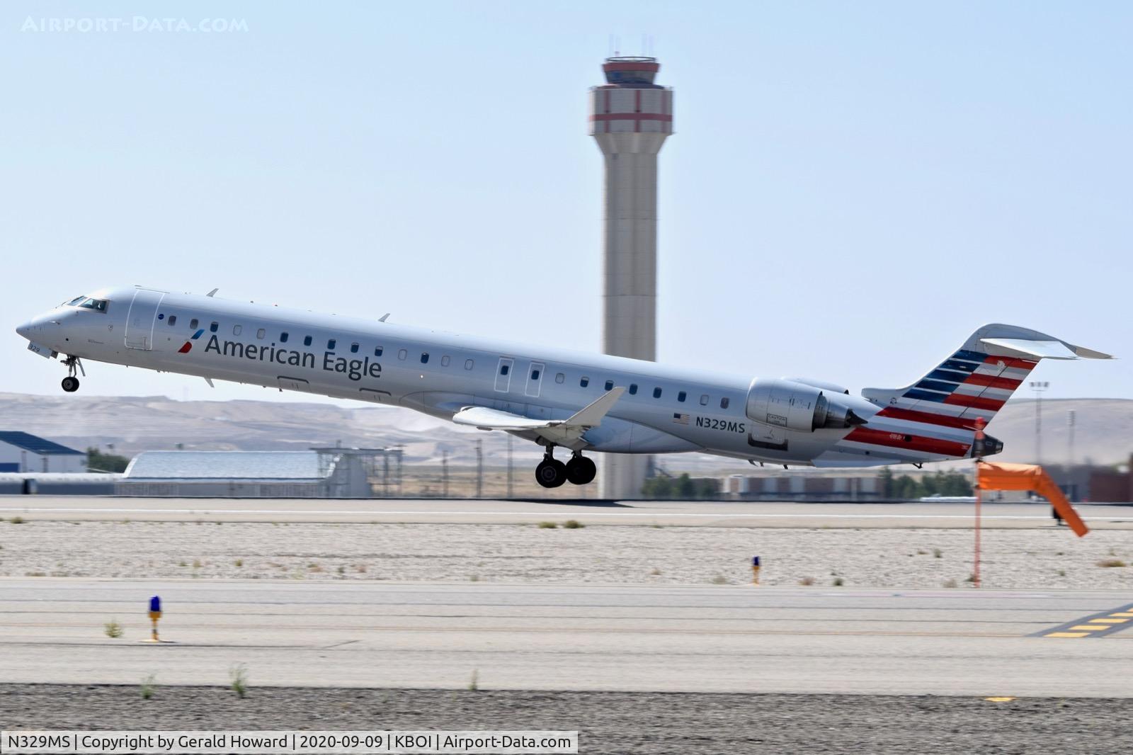 N329MS, 2008 Bombardier CRJ-900ER NG (CL-600-2D24) C/N 15126, Take off from 10L.