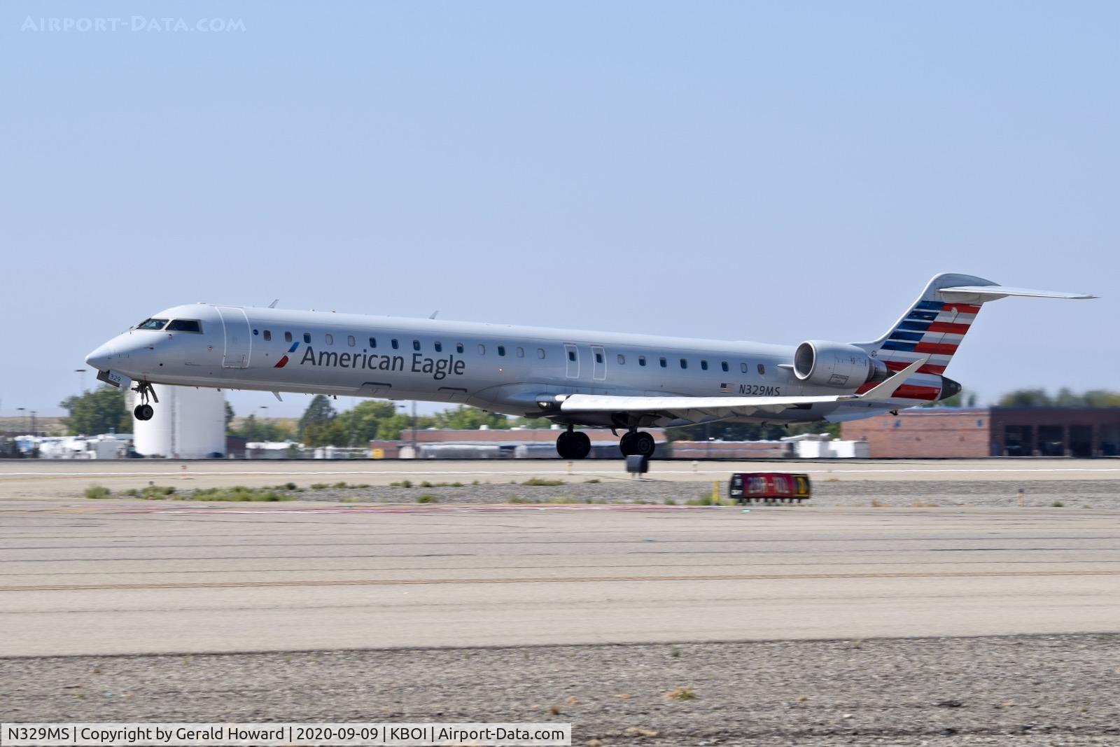 N329MS, 2008 Bombardier CRJ-900ER NG (CL-600-2D24) C/N 15126, Take off from 10L.