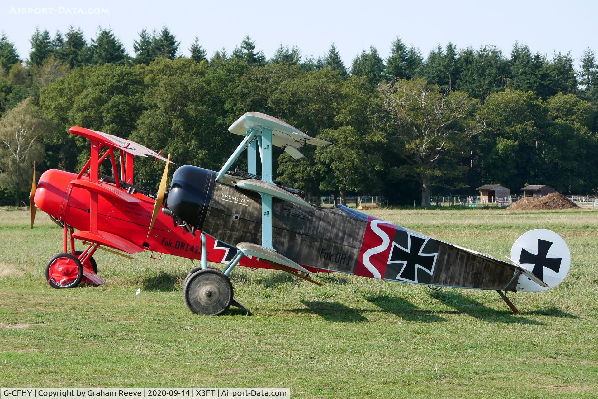 G-CFHY, 2010 Fokker Dr.1 Triplane Replica C/N PFA 238-14408, Parked at Felthorpe, with G-DREI parked behind,