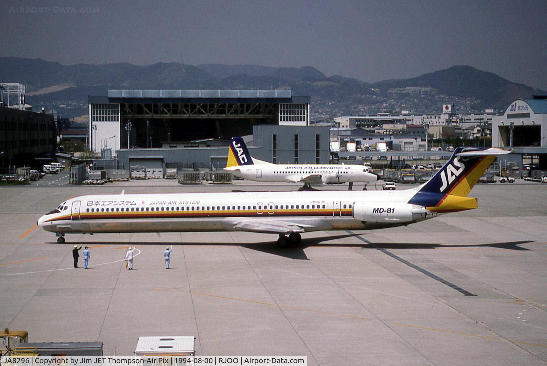 JA8296, 1990 McDonnell Douglas MD-81 (DC-9-81) C/N 49907, Notice the YS-11 and the employees saluting the departure