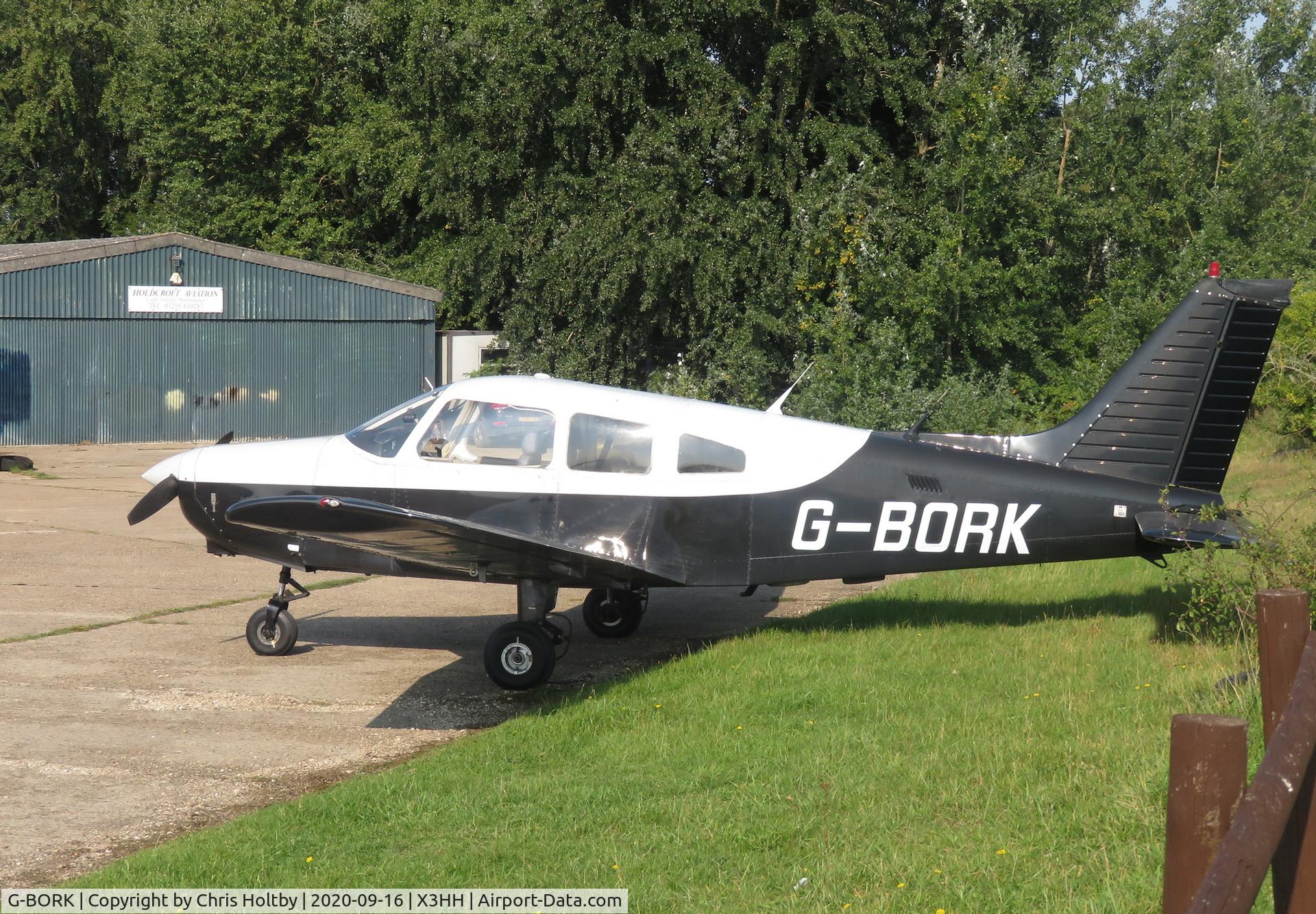 G-BORK, 1981 Piper PA-28-161 Cherokee Warrior II C/N 28-8116095, Visiting nearby airfield to its base at Turweston, parked at Hinton-in-the-Hedges
