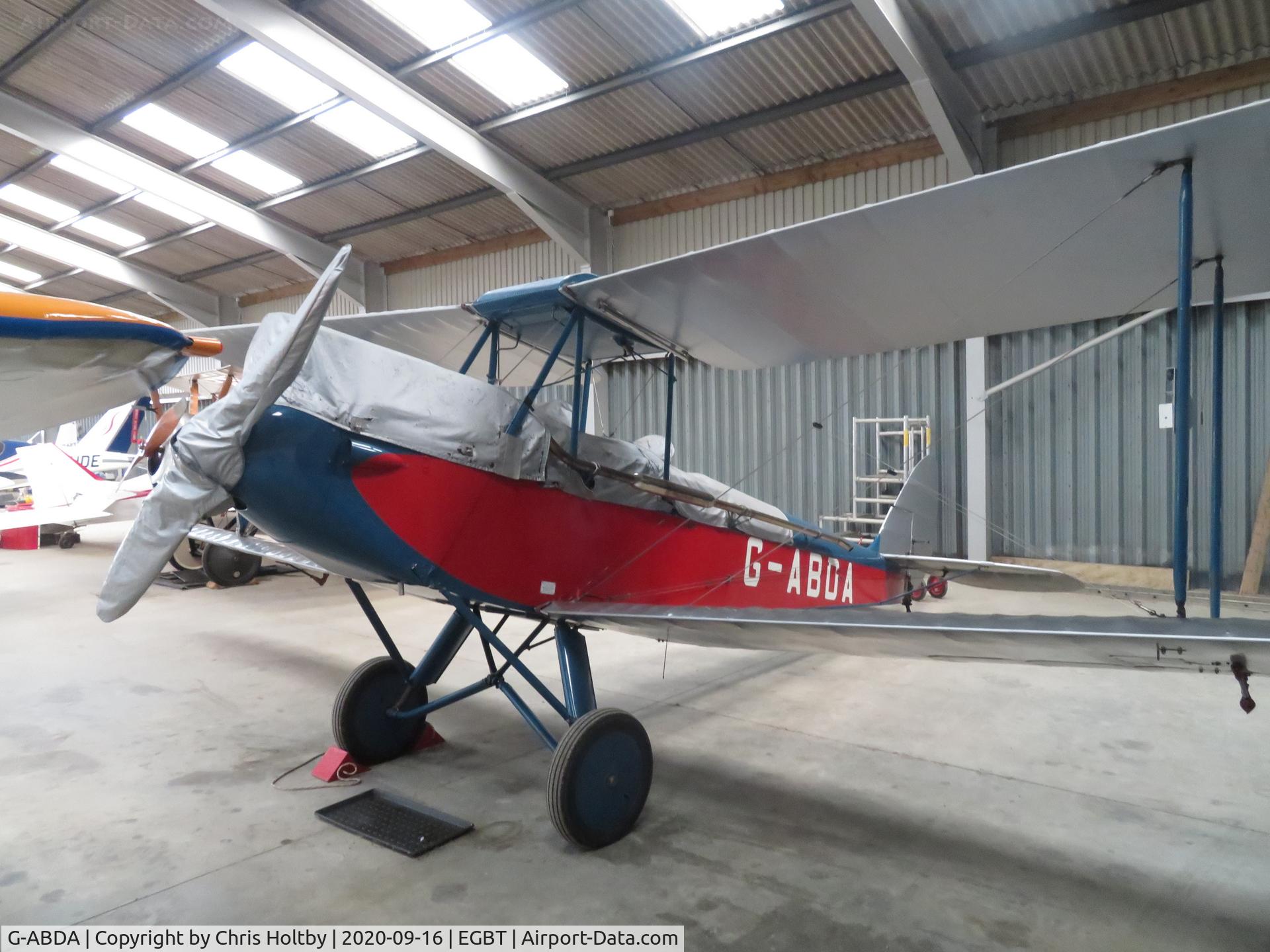G-ABDA, 1929 De Havilland DH-60G Gypsy Moth C/N 1284, 1931 built Tiger Moth in the hangar with other historics at Turweston, Bucks.