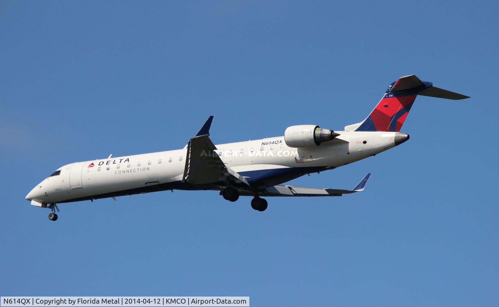 N614QX, 2002 Bombardier CRJ-701 (CL-600-2C10) Regional Jet C/N 10049, MCO 2014