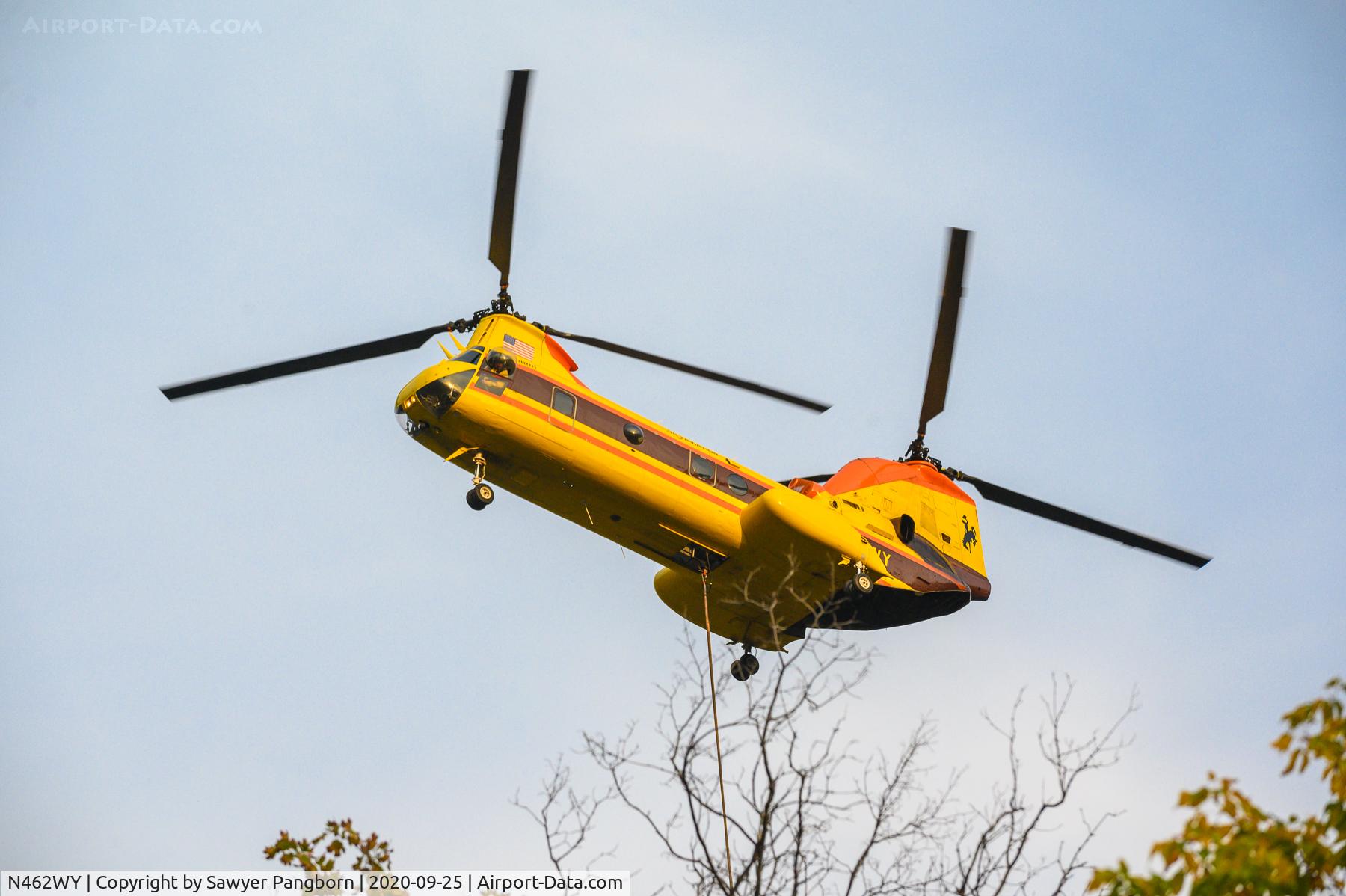 N462WY, 1970 Boeing Vertol CH-46F Sea Knight C/N 2614, N462WY, a Boeing Vertol CH-64-E, refills a Bambi bucket from Millcreek Canyon as part of aerial firefighting operations for Neff's Fire in Neff's Canyon, Utah.