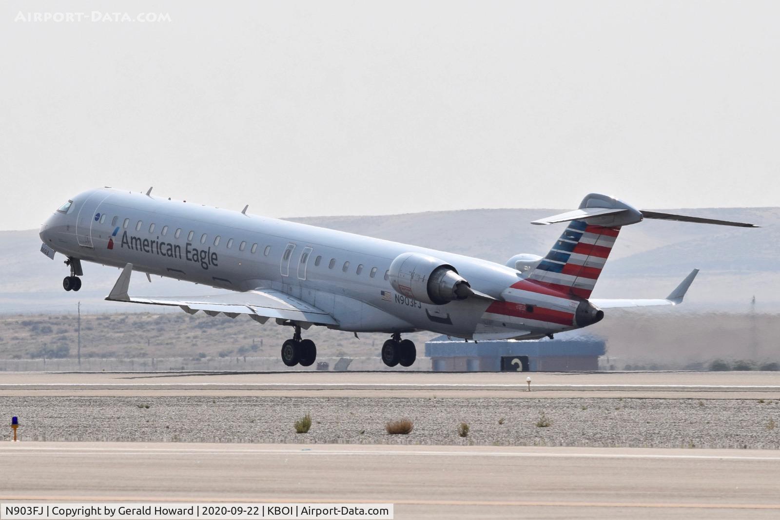 N903FJ, 2003 Bombardier CRJ-900ER (CL-600-2D24) C/N 15003, Take off from 10L.