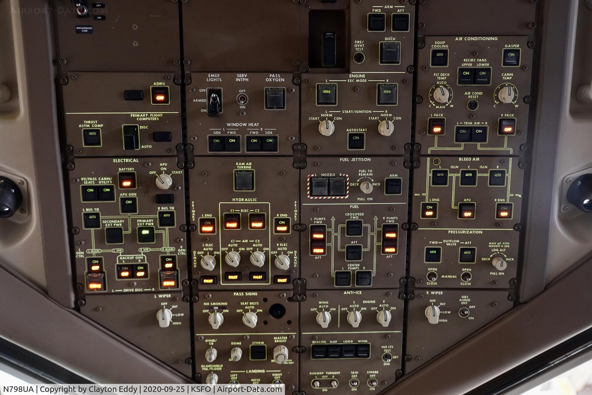 N798UA, 1998 Boeing 777-222ER C/N 26928, Overhead panel flightdeck SFO 2020.