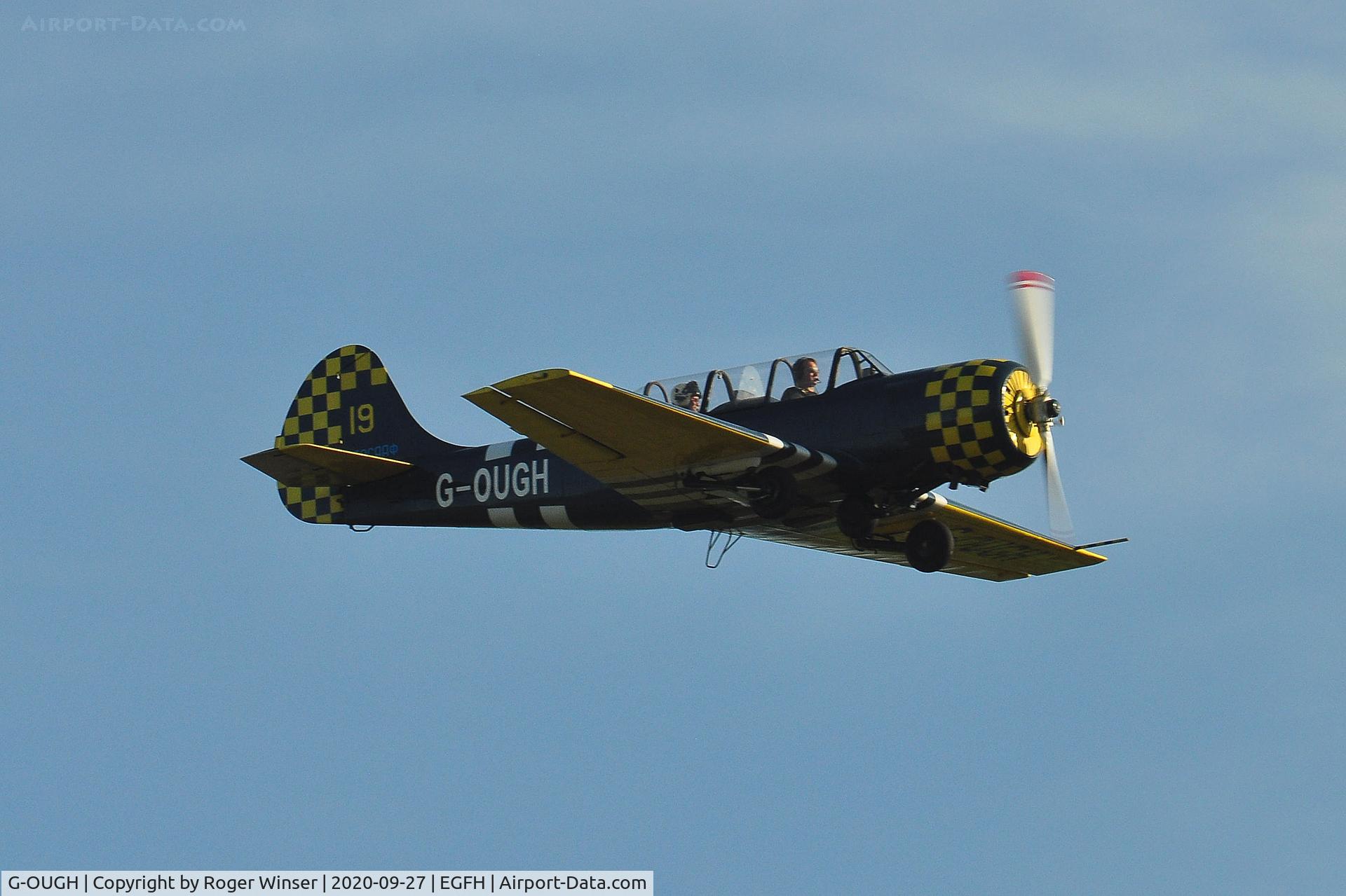 G-OUGH, 1987 Bacau Yak-52 C/N 877404, Resident Yak-52 over Runway 28