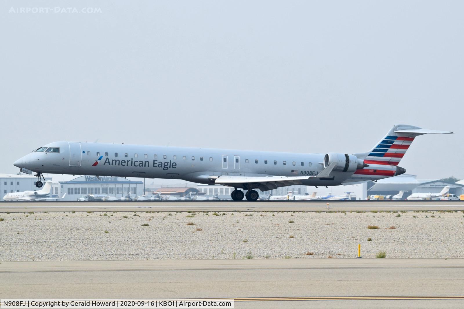 N908FJ, 2003 Bombardier CRJ-900ER (CL-600-2D24) C/N 15008, Landing 10L.
