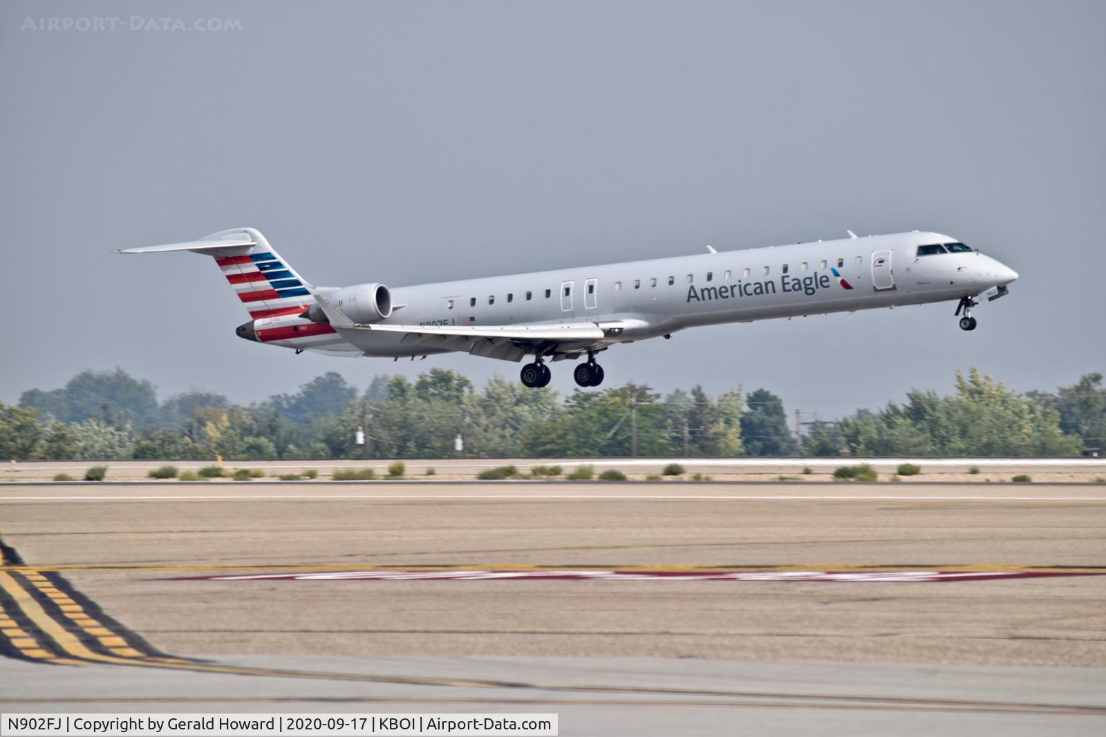 N902FJ, 2003 Bombardier CRJ-900ER (CL-600-2D24) C/N 15002, Landing 10R.