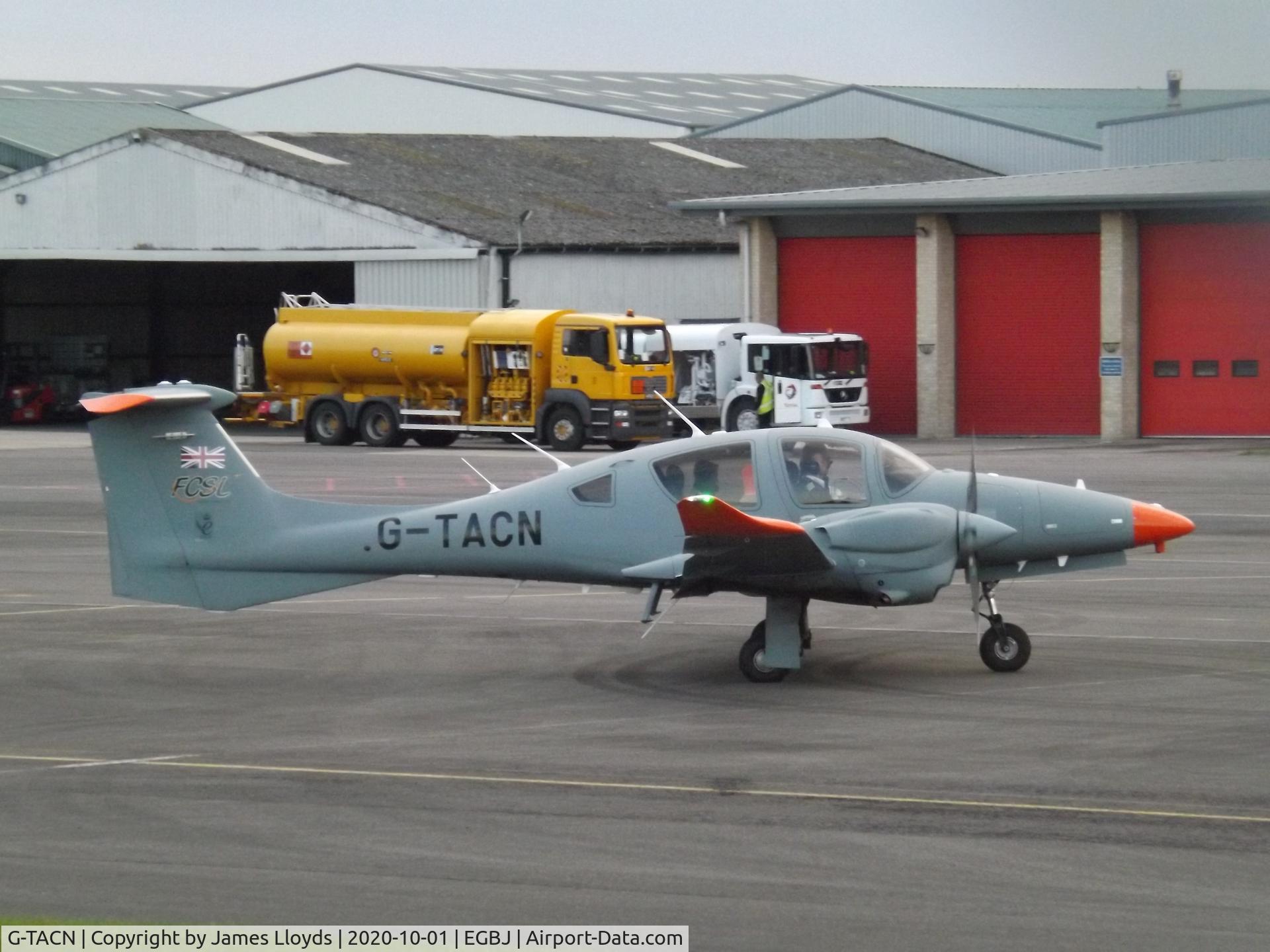G-TACN, 2017 Diamond DA-62 C/N 62.044, Taxing to RW 27 at Gloucestershire Airport.