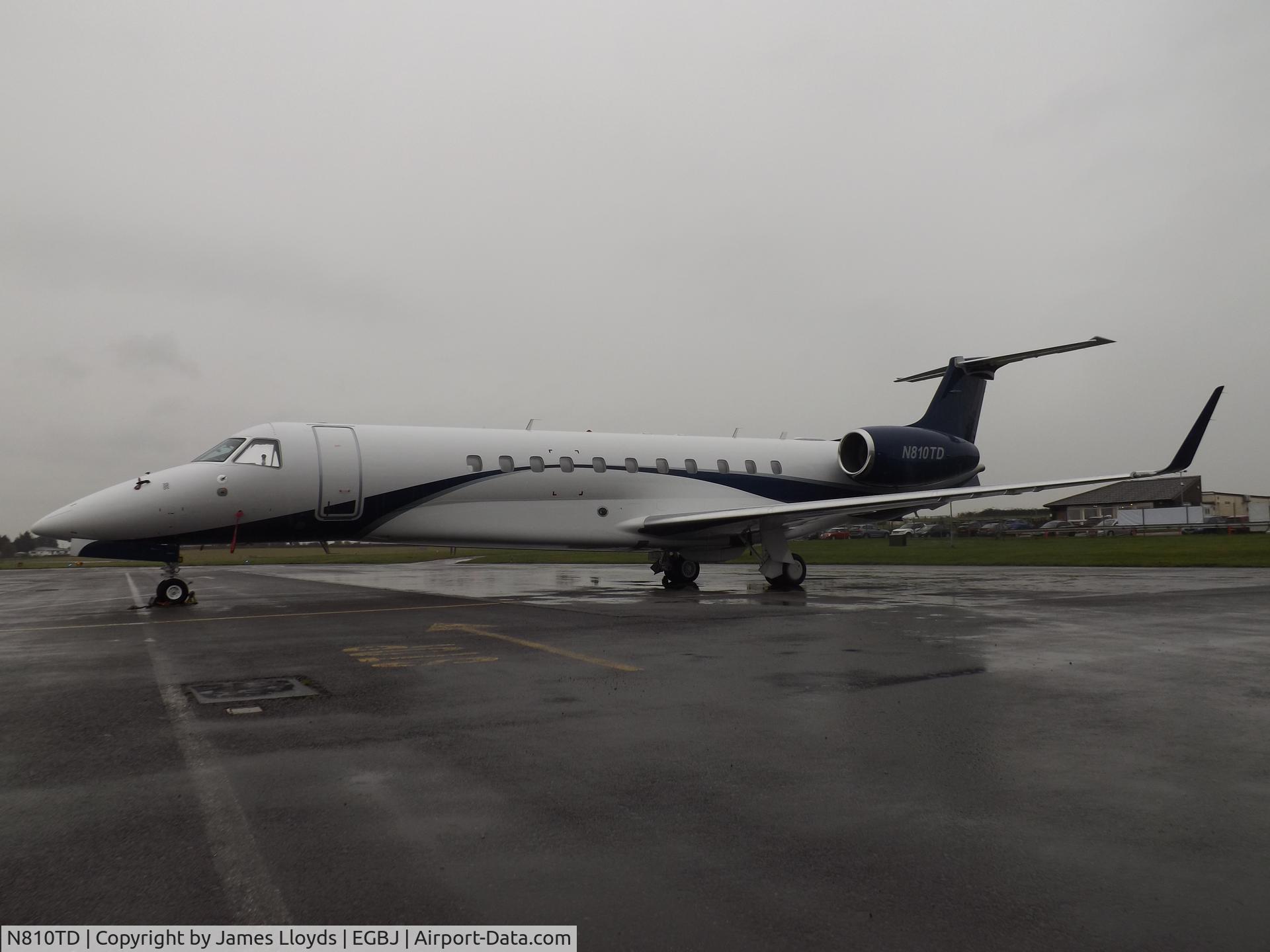 N810TD, Embraer EMB-135BJ Legacy C/N 14501194, Parked up at a wet Gloucestershire Airport after arriving the night before.