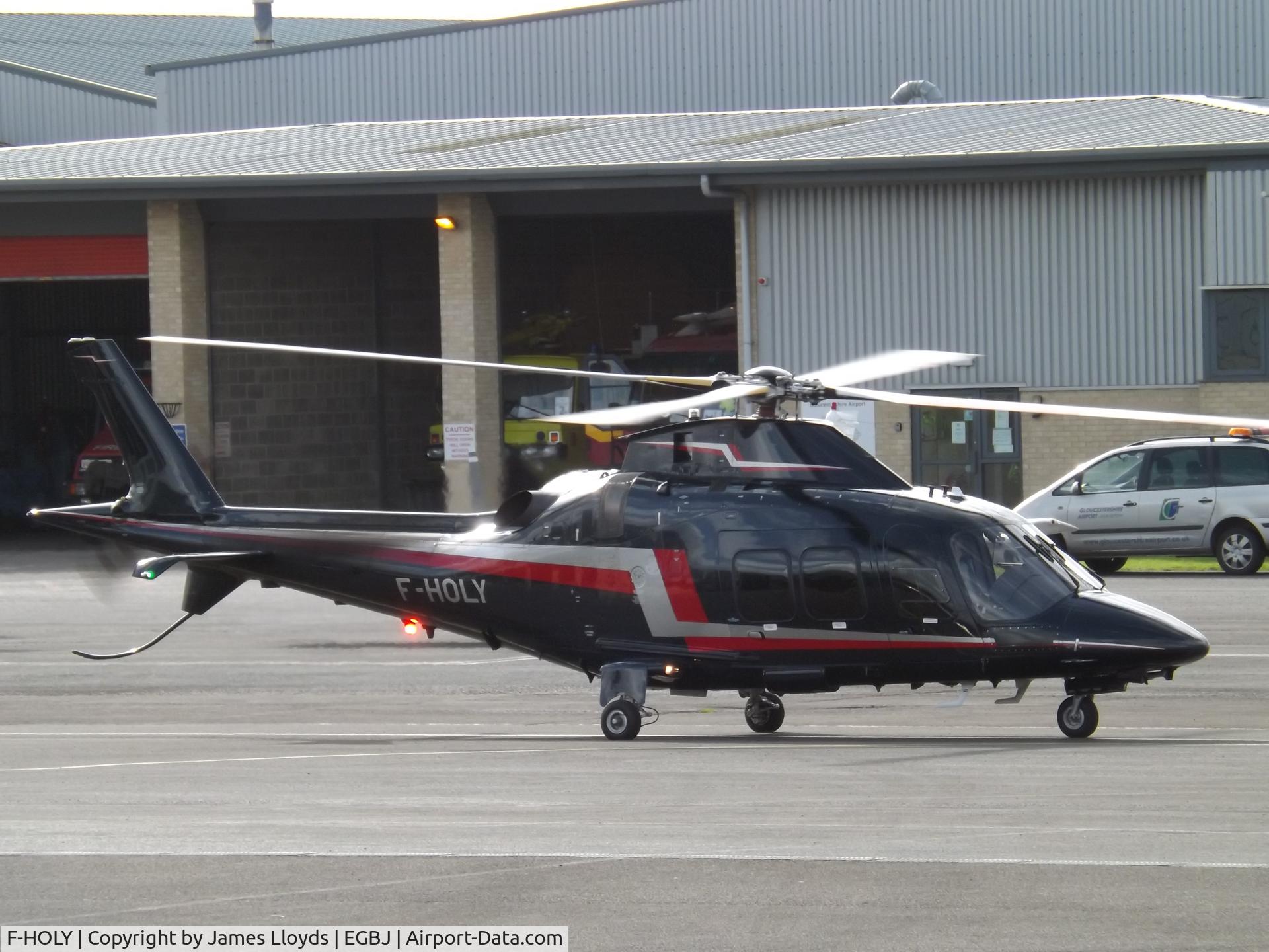 F-HOLY, 2011 AgustaWestland AW-109SP Grand New C/N 22242, Taxing out at Gloucestershire Airport.