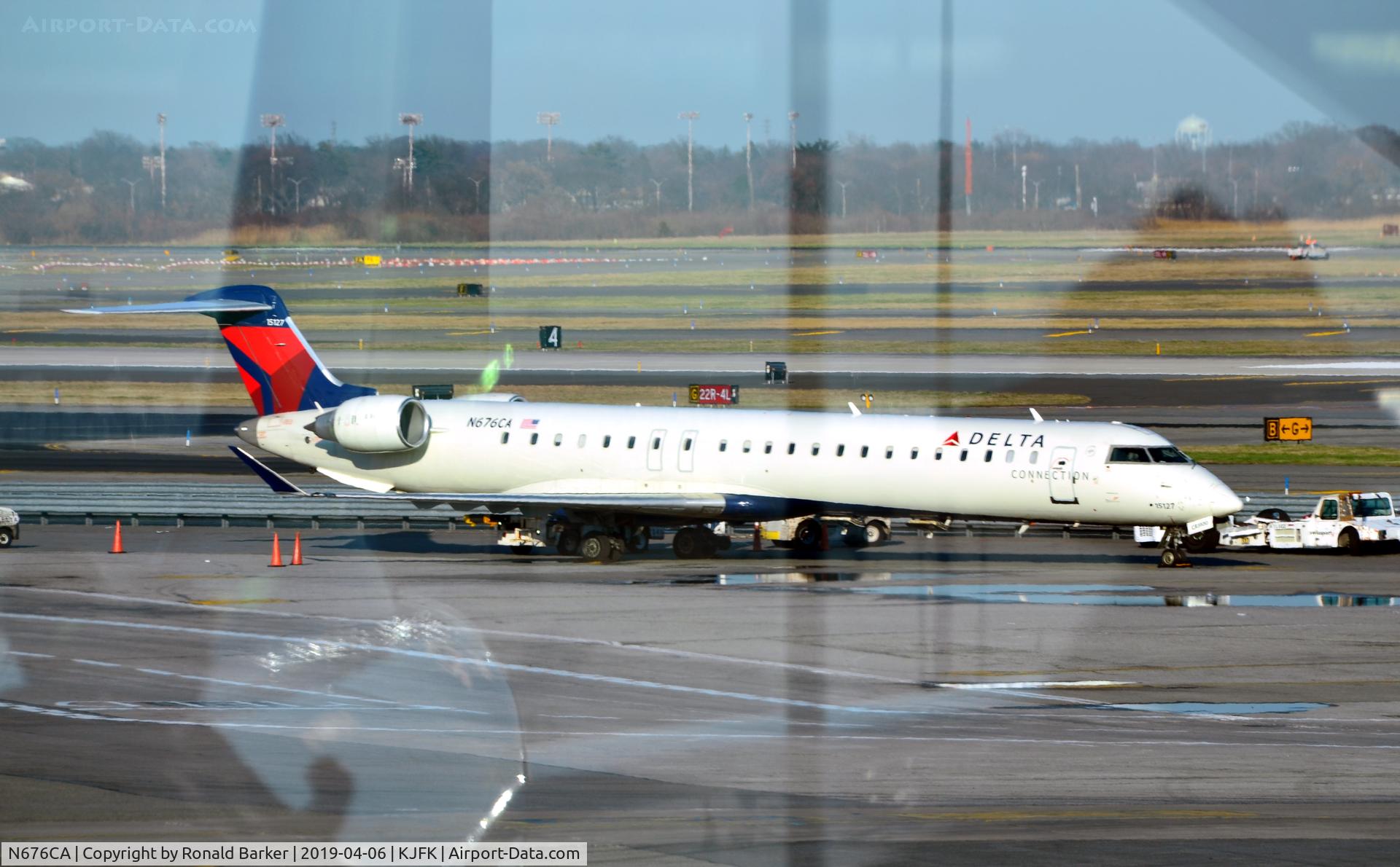 N676CA, 2007 Bombardier CRJ-900ER (CL-600-2D24) C/N 15127, Parked JFK
