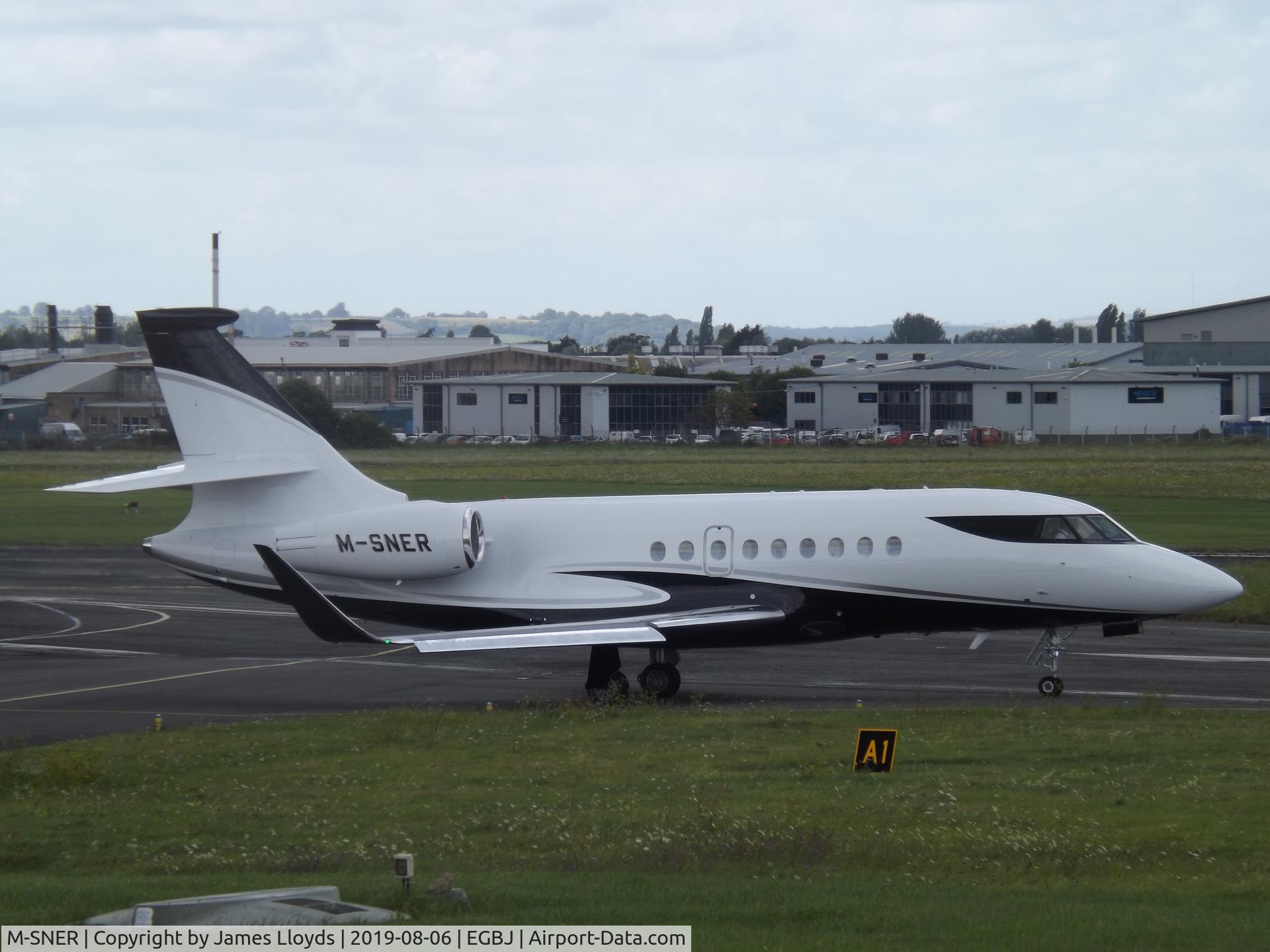 M-SNER, 2006 Dassault Falcon 2000EX C/N 95, Back Tracking RW 27 at Gloucestershire Airport.