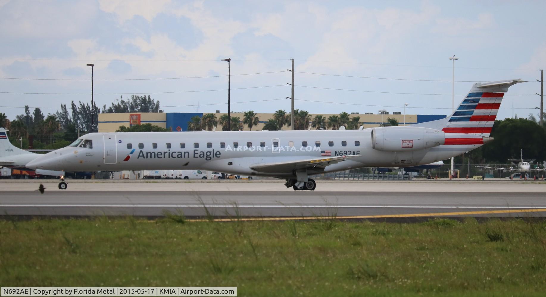 N692AE, 2004 Embraer ERJ-145LR (EMB-145LR) C/N 14500866, MIA 2015