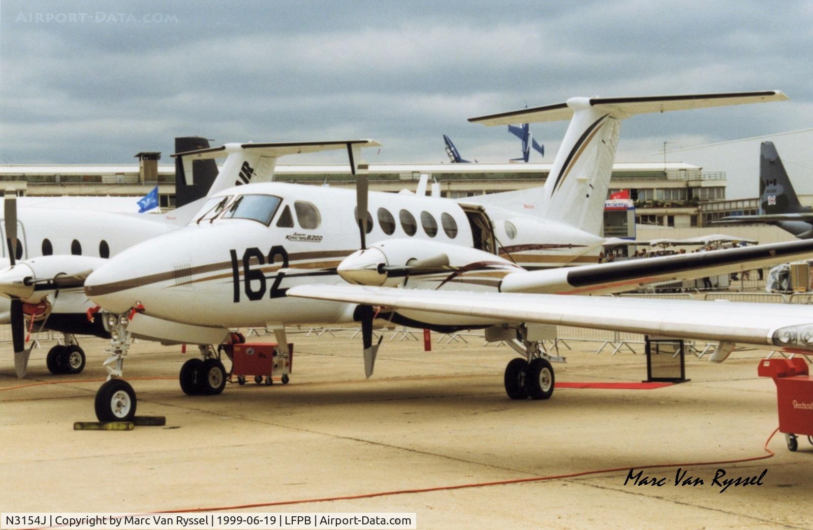 N3154J, 1999 Raytheon B200 King Air C/N BB-1654, At Paris Air Show 1999.  Later became ZS-OLM, ZS-PMM, N771JH.