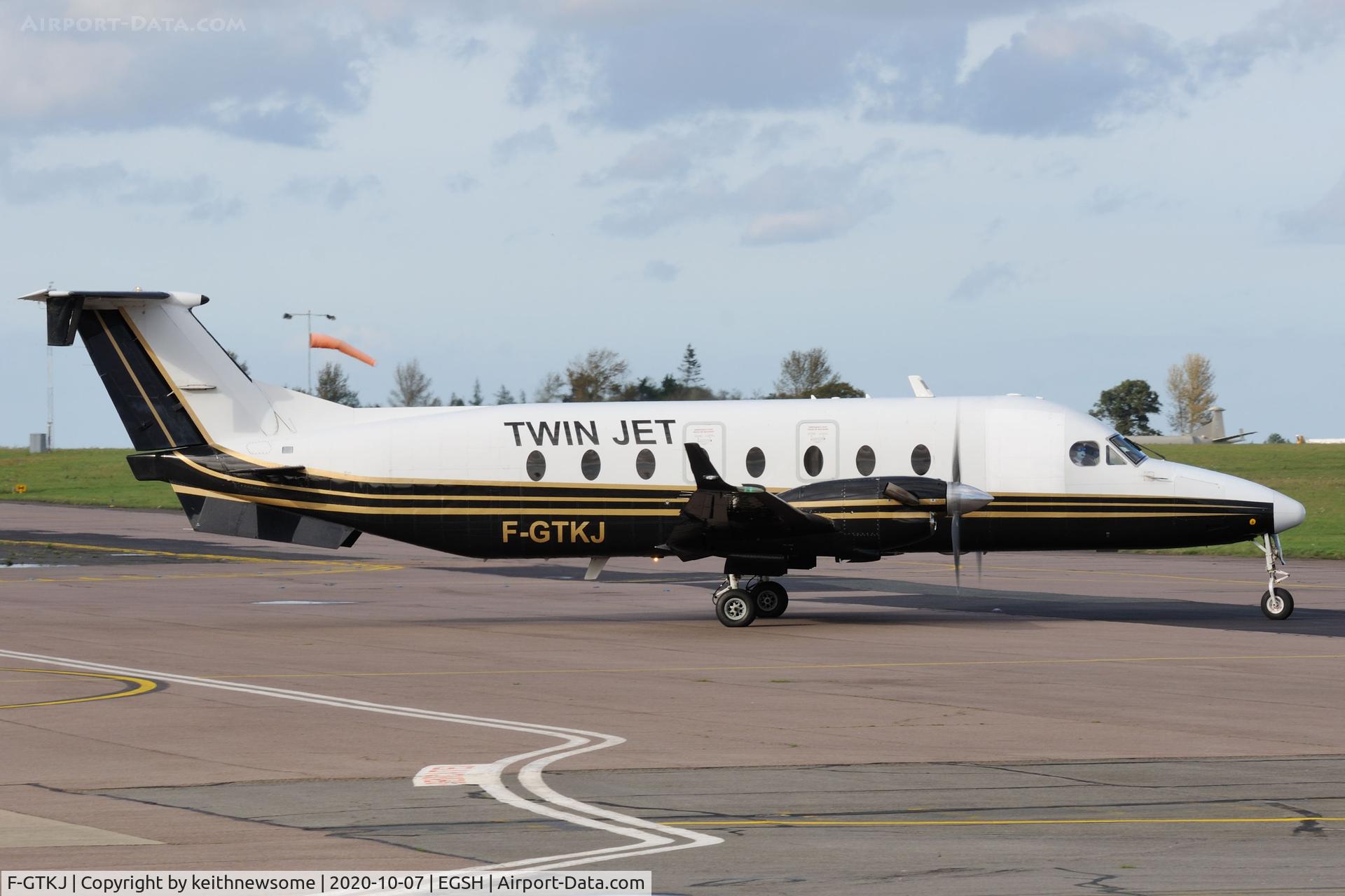 F-GTKJ, 1998 Beech 1900D C/N UE-348, Leaving Norwich for Paris.