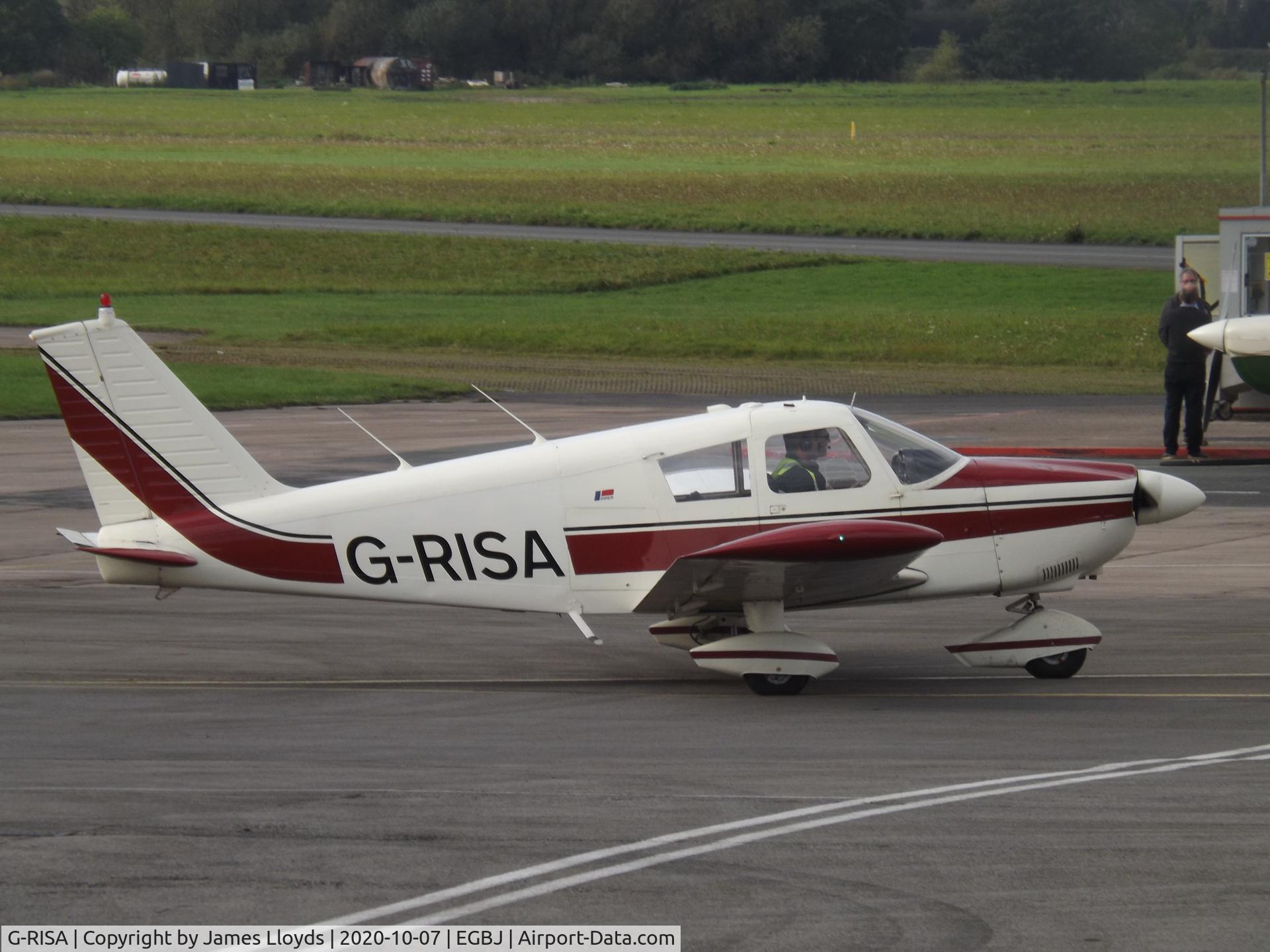 G-RISA, 1966 Piper PA-28-180 Cherokee C/N 28-3128, Taxing out for dep at Gloucestershire Airport.