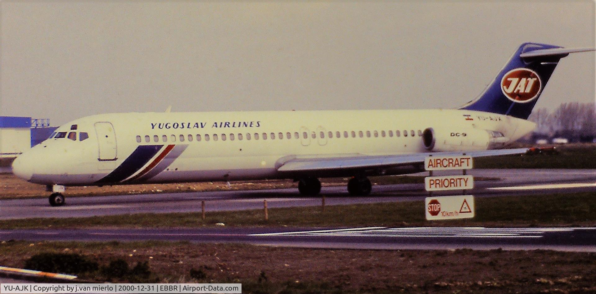 YU-AJK, 1973 Douglas DC-9-32 C/N 47568, Taxiing on A EBBR late '90s scan slide